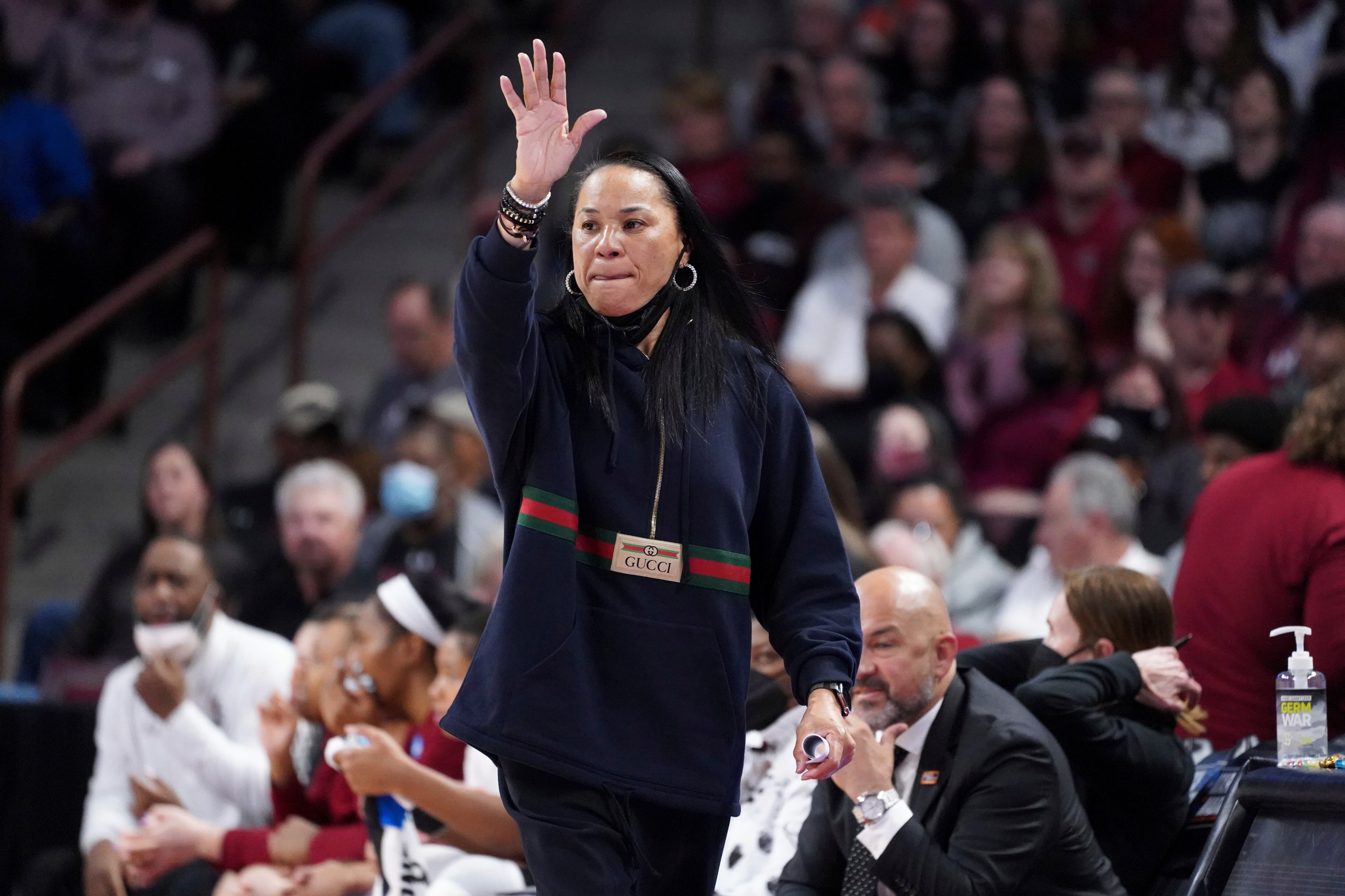 South Carolina head coach Dawn Staley communicates with players during the first half of a second-round game against Miami in the NCAA college basketball tournament, Sunday, March 20, 2022, in Columbia, S.C. South Carolina won 49-33. (AP Photo/Sean Rayford)