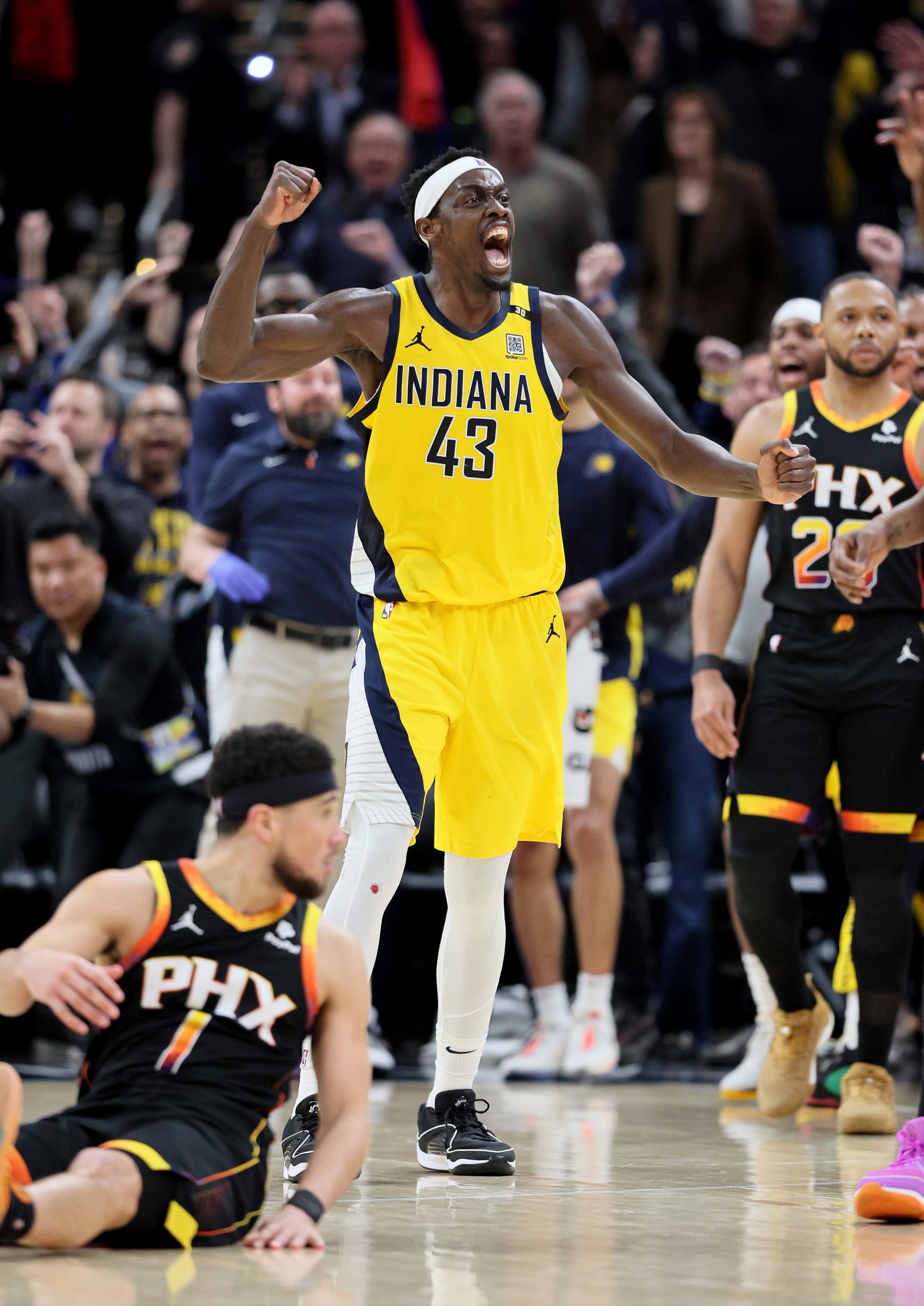 INDIANAPOLIS, INDIANA - JANUARY 26: Pascal Siakam #43 of the Indiana Pacers celebrates after Devin Booker #1 of the Phoenix Suns missed a shot at the end of regulation in the Pacers 133-131 win at Gainbridge Fieldhouse on January 26, 2024 in Indianapolis, Indiana.    NOTE TO USER: User expressly acknowledges and agrees that, by downloading and or using this photograph, User is consenting to the terms and conditions of the Getty Images License Agreement.  (Photo by Andy Lyons/Getty Images)