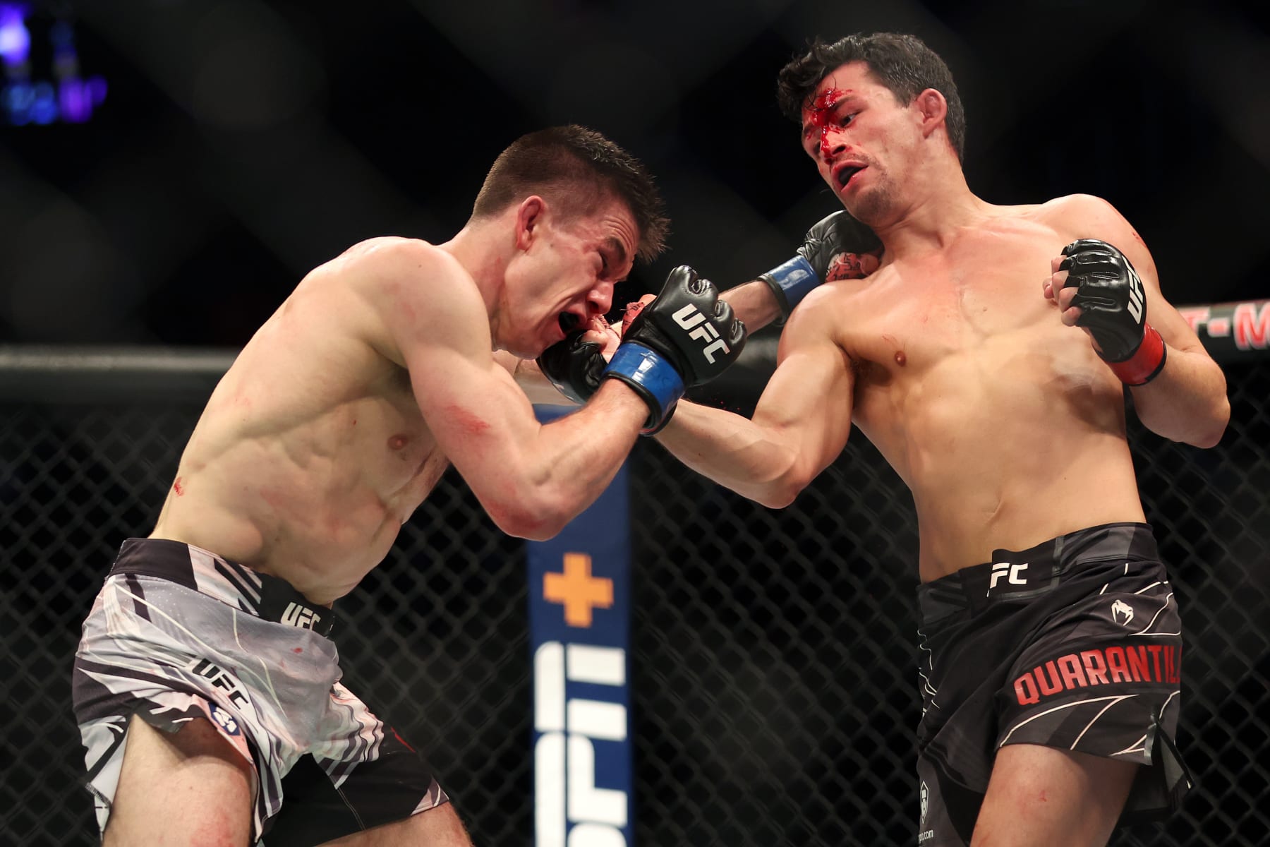 LAS VEGAS, NEVADA - DECEMBER 10: (R-L) Billy Quarantillo punches Alexander Hernandez in a featherweight fight during the UFC 282 event at T-Mobile Arena on December 10, 2022 in Las Vegas, Nevada. (Photo by Sean M. Haffey/Getty Images)