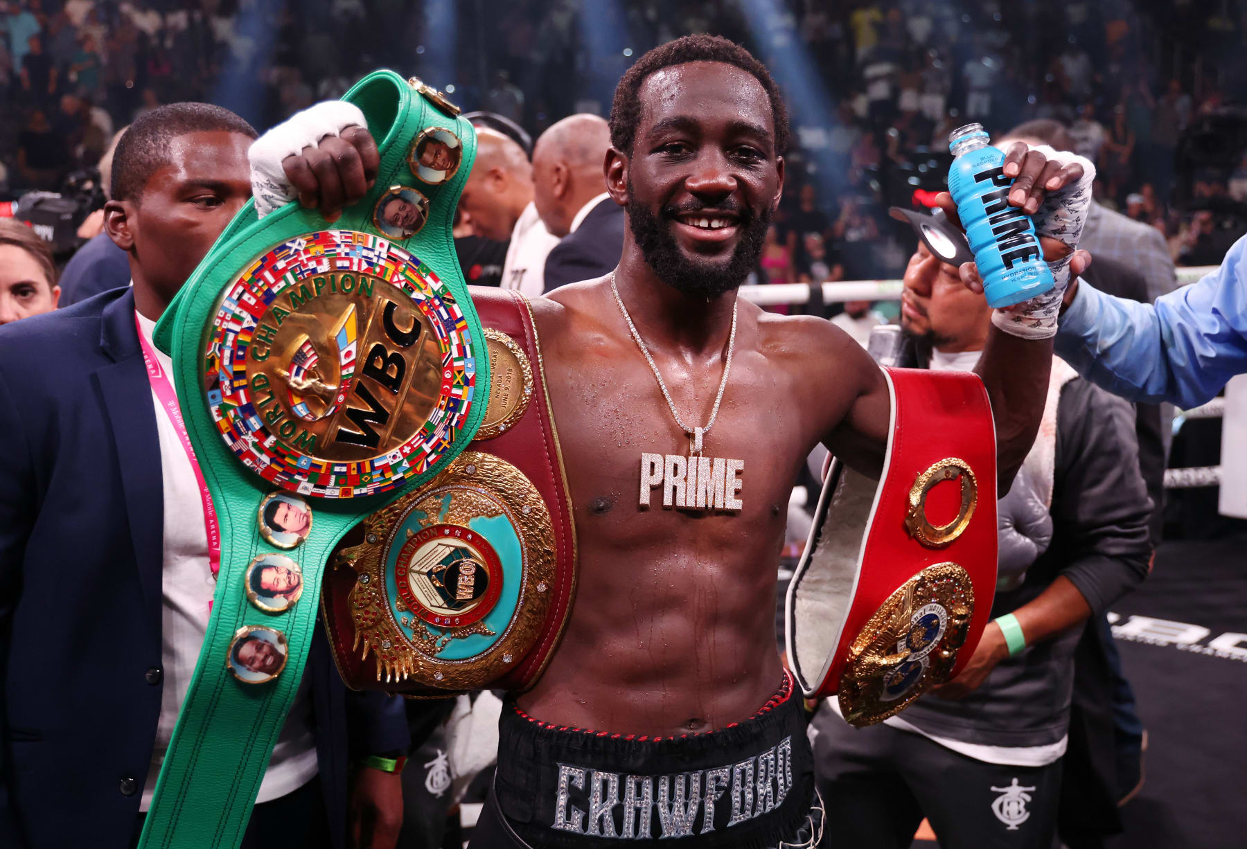 LAS VEGAS, NEVADA - JULY 29: Terrence Crawford celebrates with the championship belt after defeating Errol Spence Jr. in the World Welterweight Championship bout at T-Mobile Arena on July 29, 2023 in Las Vegas, Nevada. (Photo by Al Bello/Getty Images)
