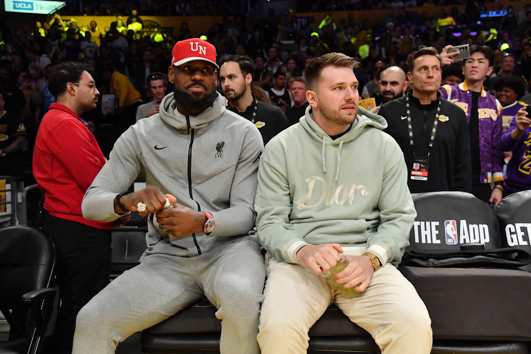 LOS ANGELES, CA - FEBRUARY 8: Luka Doncic #77 and LeBron James #23 of the Los Angeles Lakers look on before the game against the Indiana Pacers on February 8, 2025 at Crypto.Com Arena in Los Angeles, California. NOTE TO USER: User expressly acknowledges and agrees that, by downloading and/or using this Photograph, user is consenting to the terms and conditions of the Getty Images License Agreement. Mandatory Copyright Notice: Copyright 2025 NBAE (Photo by Juan Ocampo/NBAE via Getty Images)