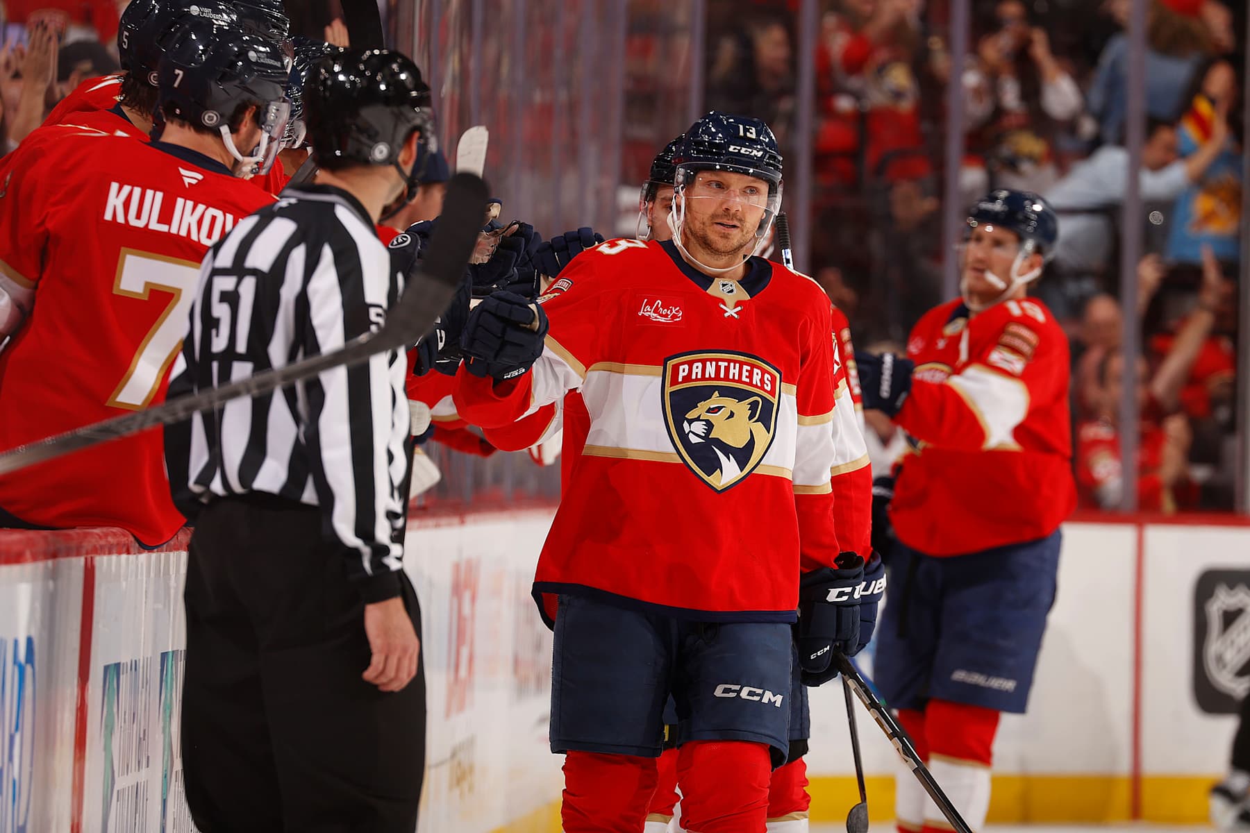 SUNRISE, FLORIDA - NOVEMBER 12: Sam Reinhart #13 of the Florida Panthers celebrates his goal with teammates during the second period against the New Jersey Devils at the Amerant Bank Arena on November 12, 2024 in Sunrise, Florida. (Photo by Eliot J. Schechter/NHLI via Getty Images)