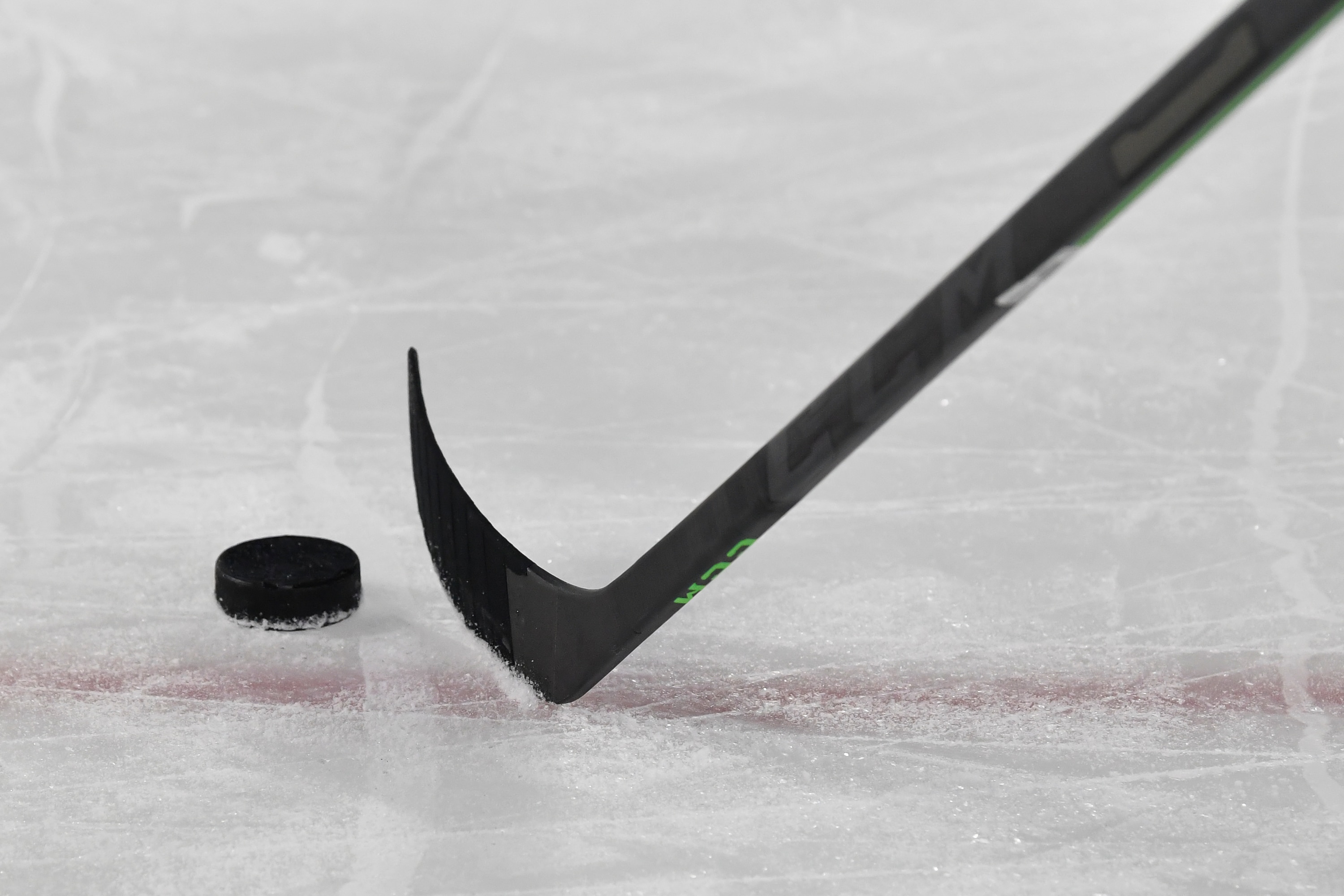 LAVAL, QC - OCTOBER 27:  A view of a CCM stick and puck during the warmups between the Toronto Marlies and the Laval Rocket at Place Bell on October 27, 2021 in Montreal, Canada.  The Laval Rocket defeated the Toronto Marlies 5-0.  (Photo by Minas Panagiotakis/Getty Images)