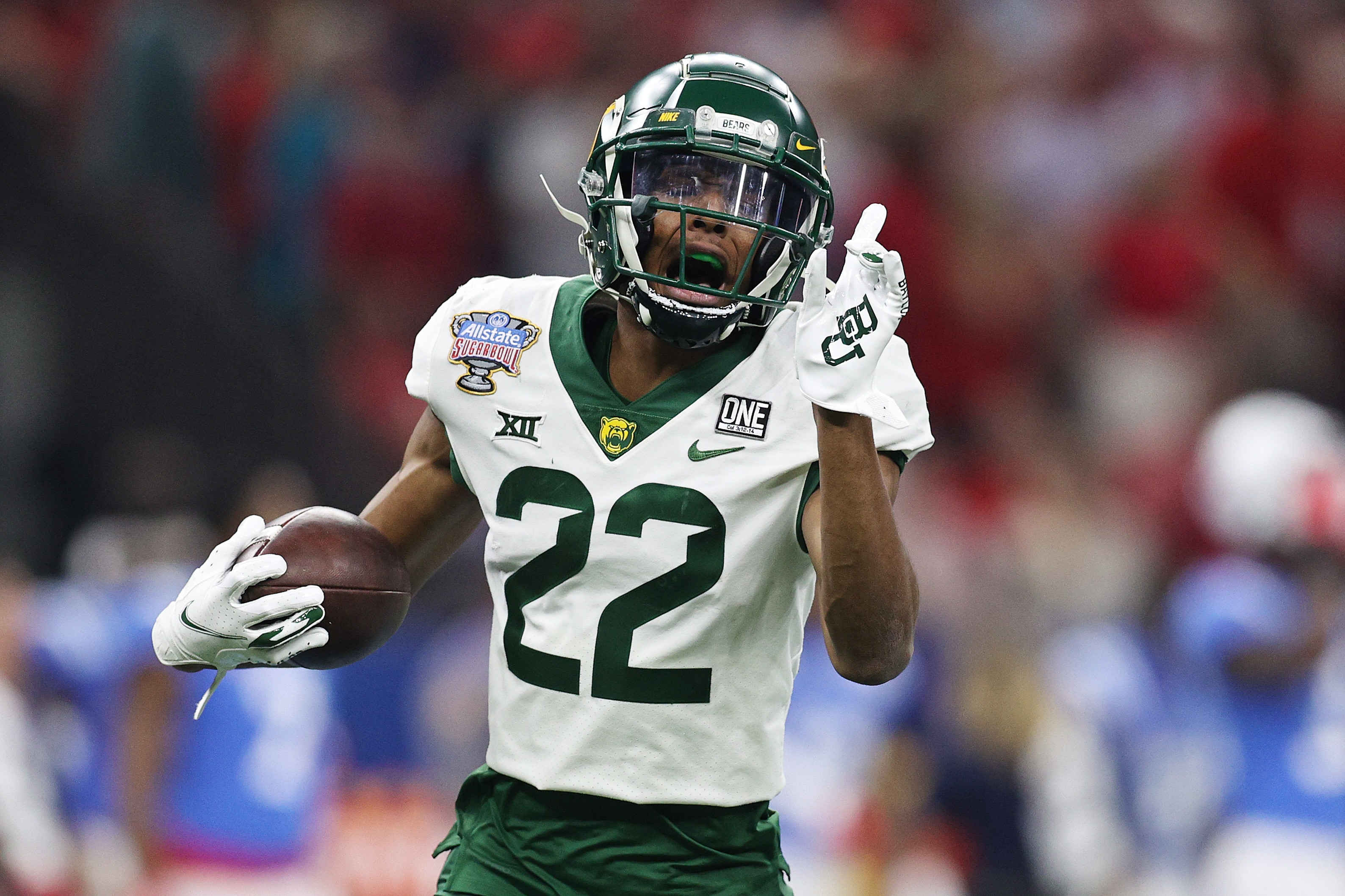 NEW ORLEANS, LOUISIANA - JANUARY 01: JT Woods #22 of the Baylor Bears celebrates against the Mississippi Rebels during the first quarter in the Allstate Sugar Bowl at Caesars Superdome on January 01, 2022 in New Orleans, Louisiana. (Photo by Sean Gardner/Getty Images)