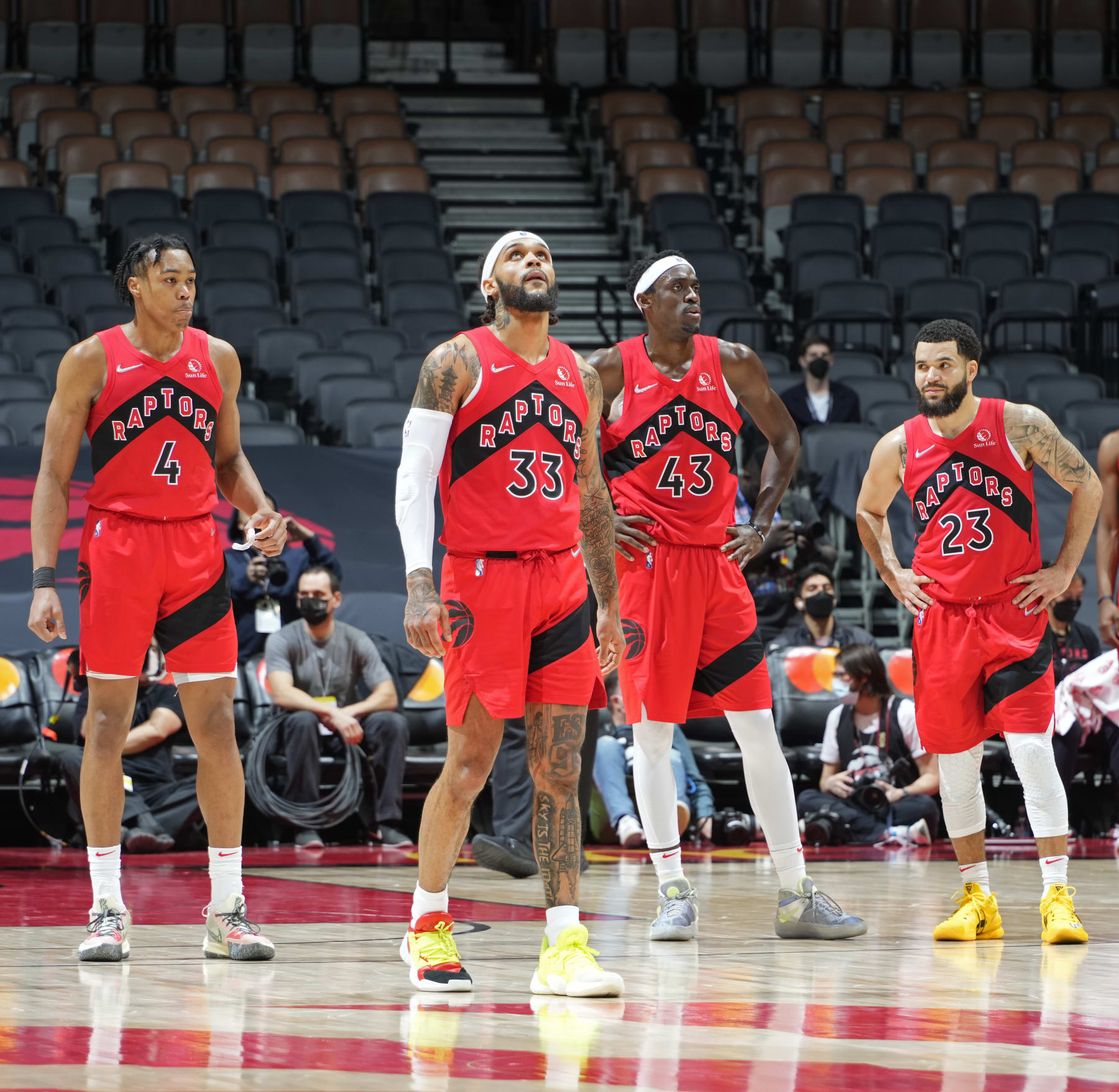TORONTO, CANADA - FEBRUARY 1: Scottie Barnes #4, Gary Trent Jr. #33, Pascal Siakam #43 and Fred VanVleet #23 of the Toronto Raptors look on during the game against the Miami Heat on February 1, 2022 at the Scotiabank Arena in Toronto, Ontario, Canada.  NOTE TO USER: User expressly acknowledges and agrees that, by downloading and or using this Photograph, user is consenting to the terms and conditions of the Getty Images License Agreement.  Mandatory Copyright Notice: Copyright 2022 NBAE (Photo by Kevin Sousa/NBAE via Getty Images)