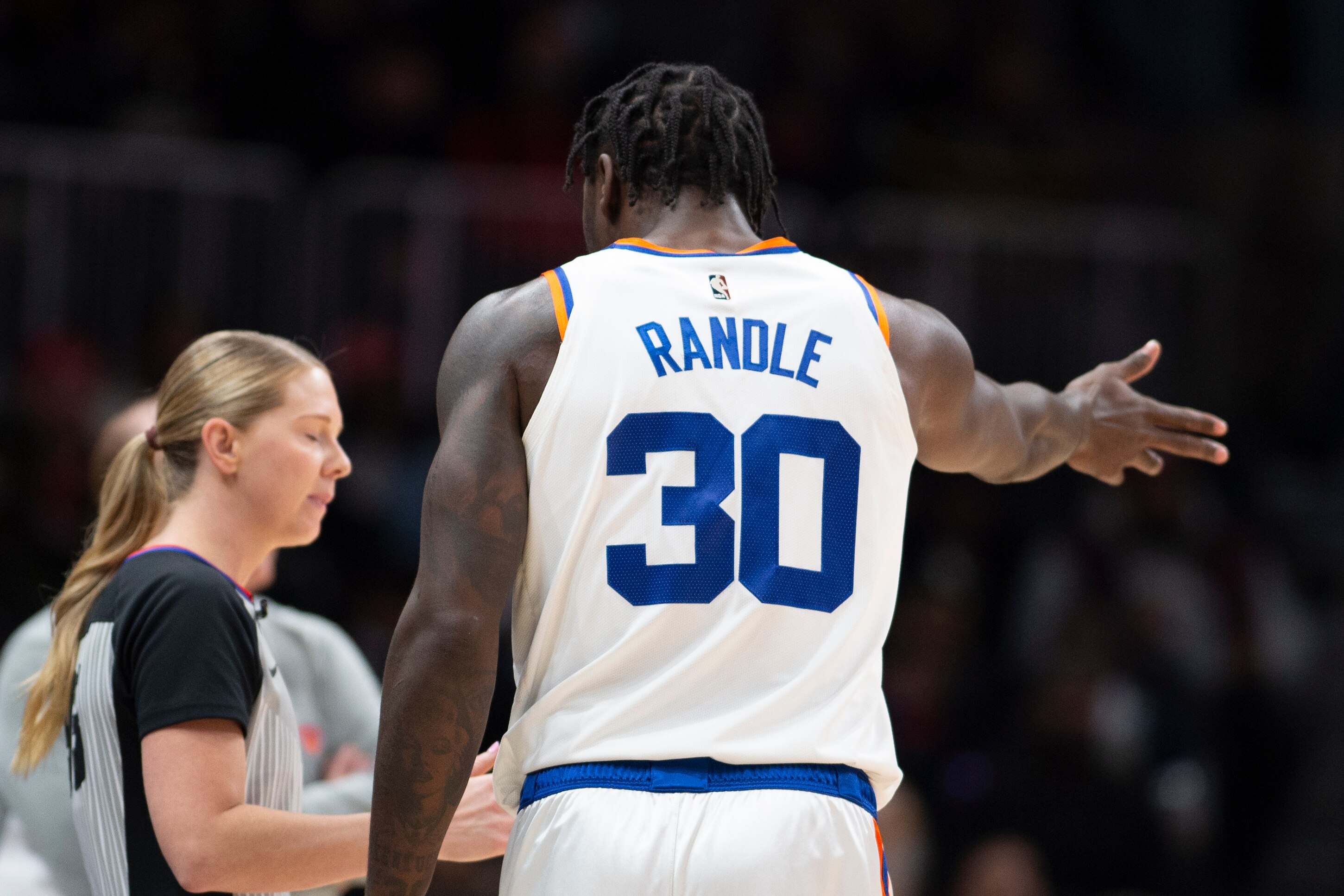 New York Knicks forward Julius Randle (30) talks referee during the first half of an NBA basketball game against the Atlanta Hawks Saturday, Nov. 27, 2021, in Atlanta. (AP Photo/Hakim Wright Sr.)