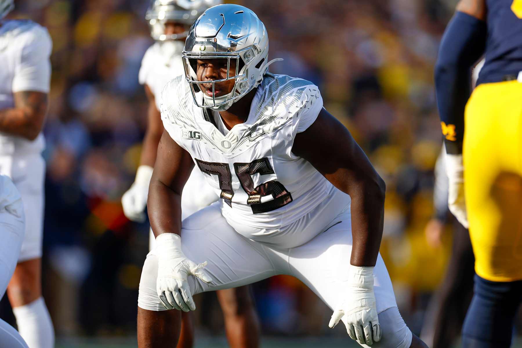 ANN ARBOR, MICHIGAN - NOVEMBER 2: Josh Conerly Jr. #76 of the Oregon Ducks lines up on the line of scrimmage during the first half of a game against the Michigan Wolverines at Michigan Stadium on November 2, 2024 in Ann Arbor, Michigan. (Photo by Brandon Sloter/Image Of Sport/Getty Images)