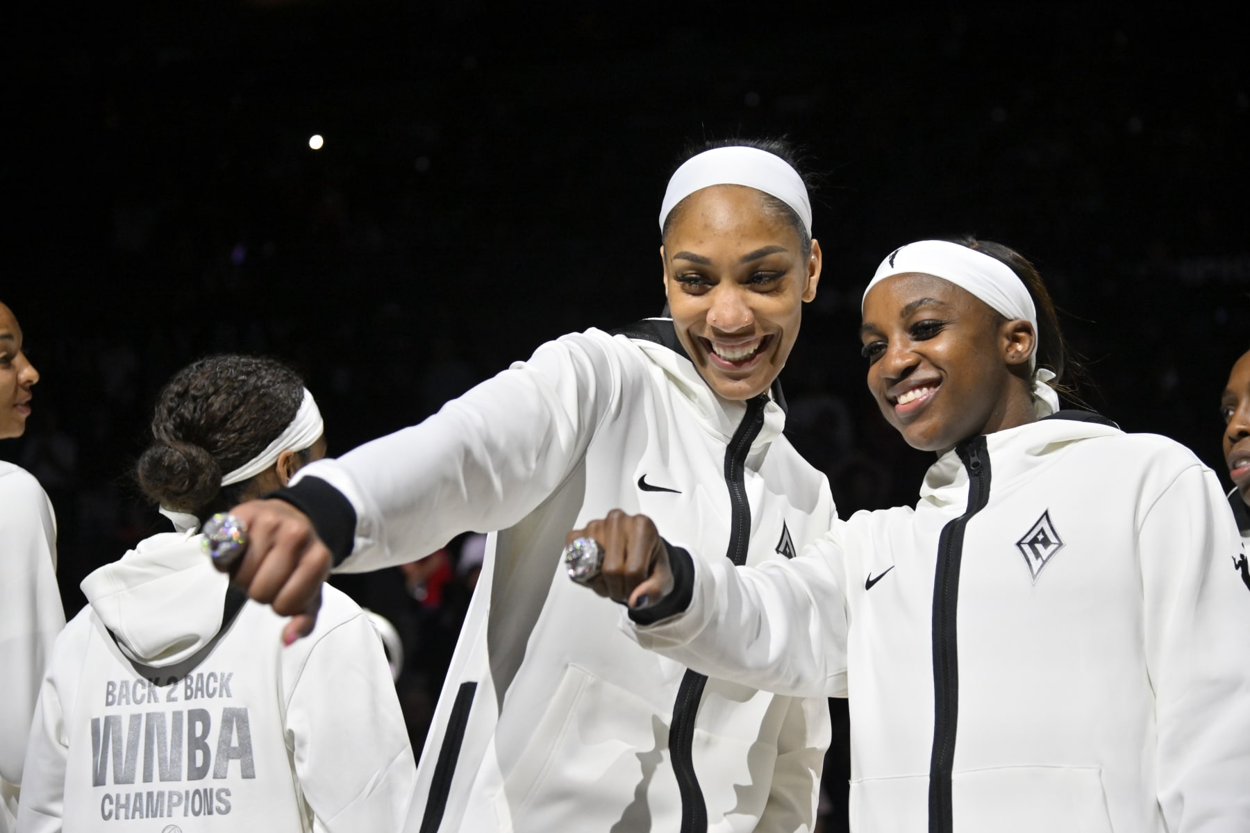 LAS VEGAS, NV - MAY 14: A'ja Wilson #22 and Jackie Young #0 of the Las Vegas Aces pose for a portrait during the 2023 Championship ring ceremony before the game against the Phoenix Mercury on May 14, 2024 at Michelob ULTRA Arena in Las Vegas, Nevada. NOTE TO USER: User expressly acknowledges and agrees that, by downloading and or using this photograph, User is consenting to the terms and conditions of the Getty Images License Agreement. Mandatory Copyright Notice: Copyright 2024 NBAE (Photo by David Becker/NBAE via Getty Images)