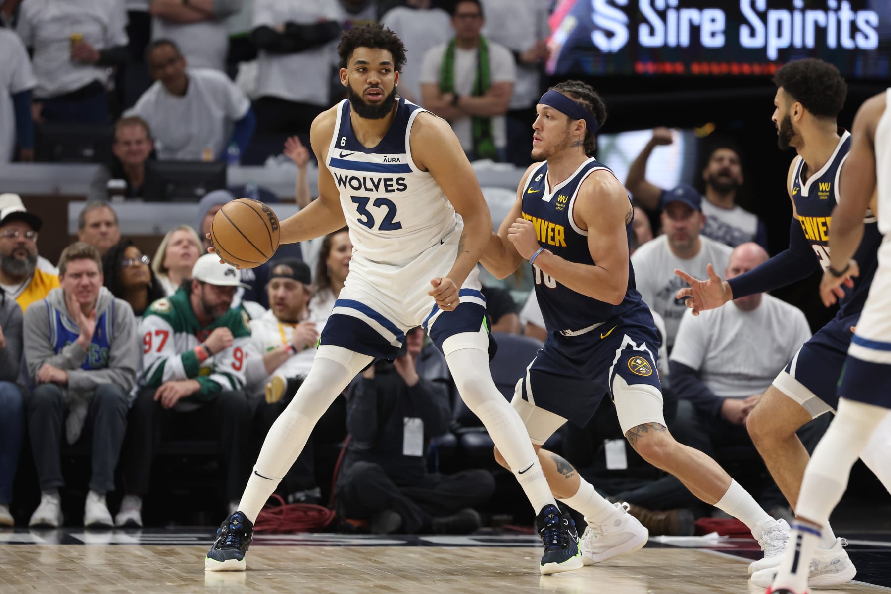 MINNEAPOLIS, MINNESOTA - APRIL 23: Karl-Anthony Towns #32 of the Minnesota Timberwolves posts up against Aaron Gordon #50 of the Denver Nuggets during the fourth quarter at Target Center on April 23, 2023 in Minneapolis, Minnesota. NOTE TO USER: User expressly acknowledges and agrees that, by downloading and or using this photograph, User is consenting to the terms and conditions of the Getty Images License Agreement. (Photo by Gregory Shamus/Getty Images)