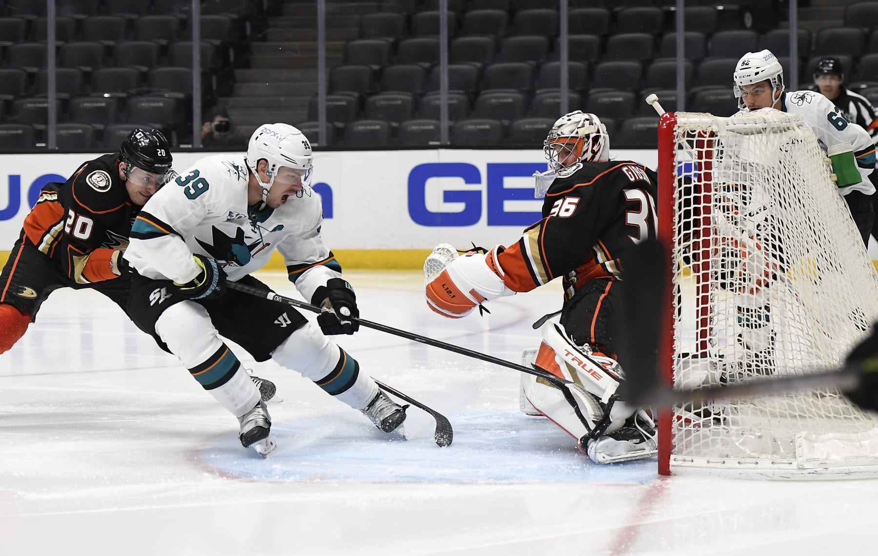 San Jose Sharks captain Logan Couture (left) and Anaheim Ducks goaltender John Gibson. 