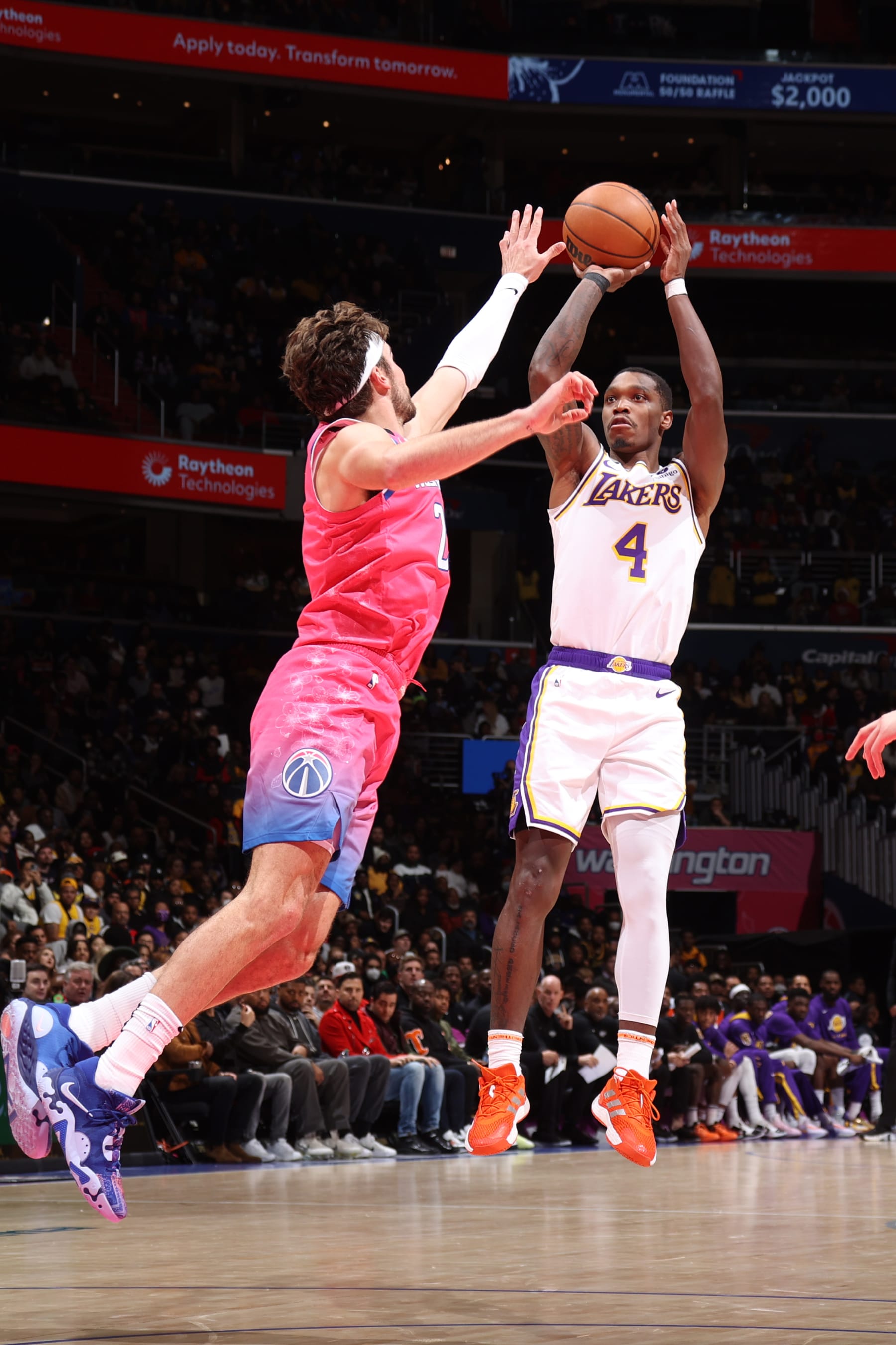 WASHINGTON, DC -  DECEMBER 4: Lonnie Walker IV #4 of the Los Angeles Lakers shoots the ball during the game against the Washington Wizards on December 4, 2022 at Capital One Arena in Washington, DC. NOTE TO USER: User expressly acknowledges and agrees that, by downloading and or using this Photograph, user is consenting to the terms and conditions of the Getty Images License Agreement. Mandatory Copyright Notice: Copyright 2022 NBAE (Photo by Stephen Gosling/NBAE via Getty Images)