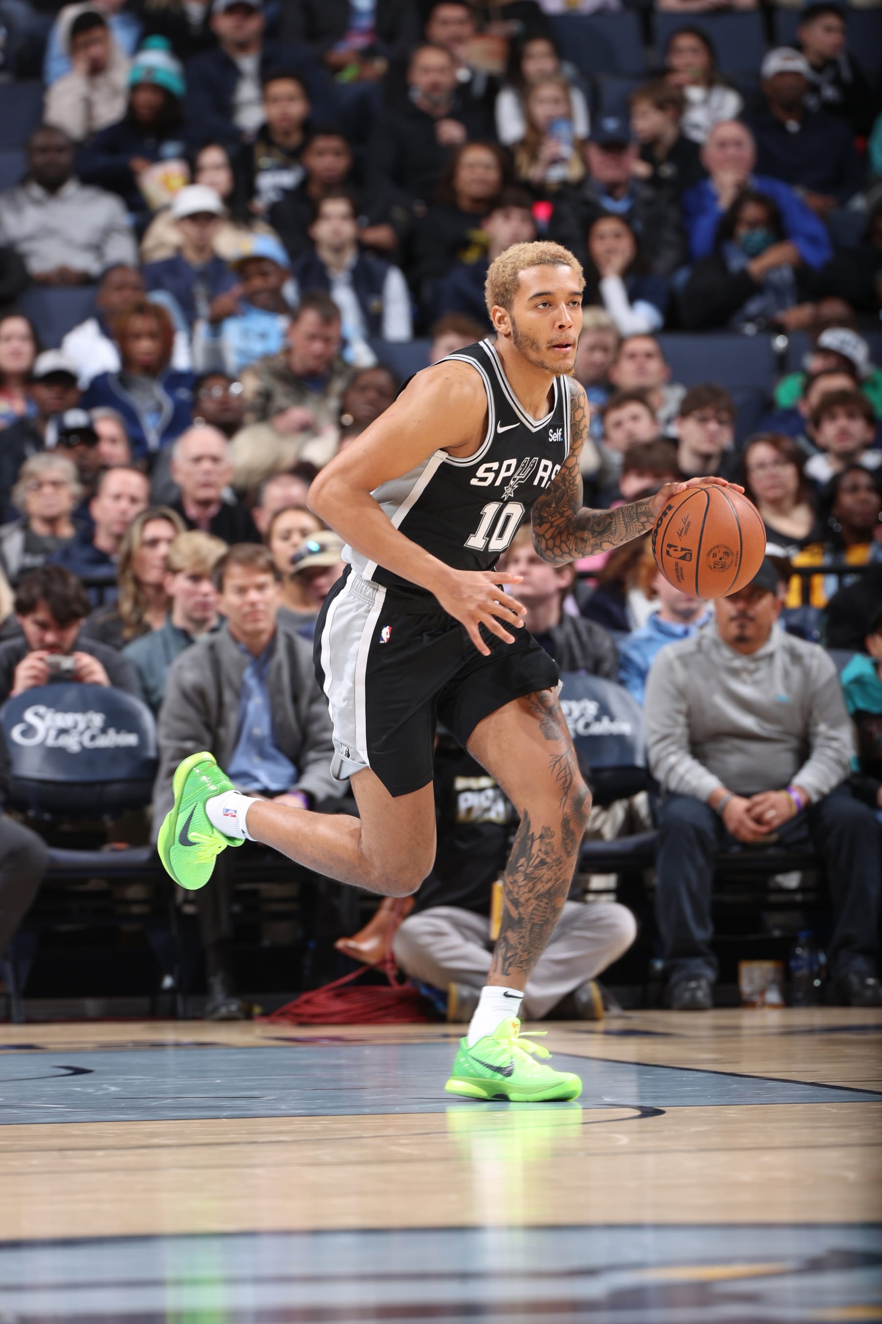 MEMPHIS, TN - JANUARY 2:  Jeremy Sochan #10 of the San Antonio Spurs handles the ball during the game  on January 2, 2024 at FedExForum in Memphis, Tennessee. NOTE TO USER: User expressly acknowledges and agrees that, by downloading and or using this photograph, User is consenting to the terms and conditions of the Getty Images License Agreement. Mandatory Copyright Notice: Copyright 2024 NBAE (Photo by Joe Murphy/NBAE via Getty Images)