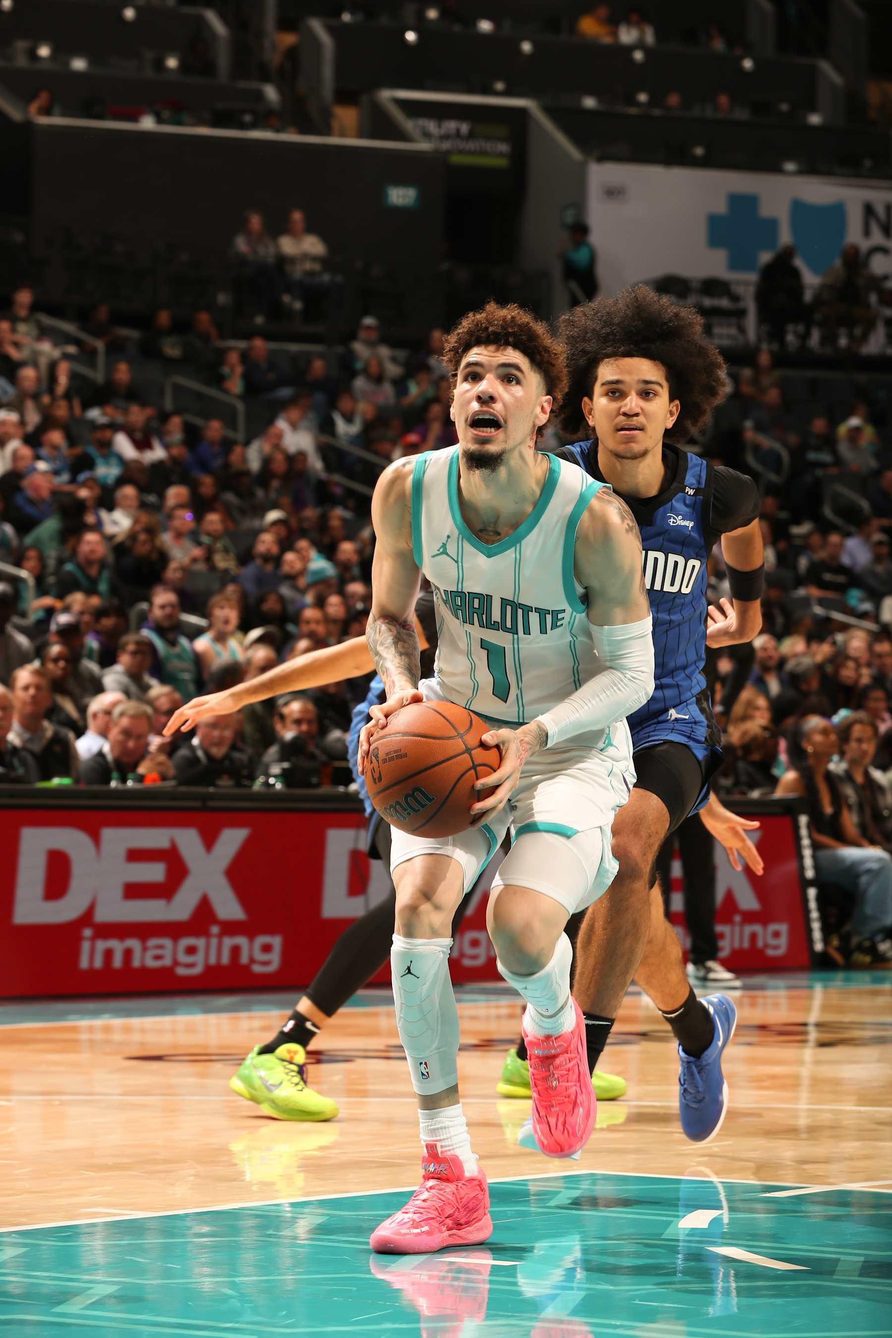 CHARLOTTE, NC - NOVEMBER 25:  LaMelo Ball #1 of the Charlotte Hornets drives to the basket during the game against the Orlando Magic during a regular season game on November 25, 2024 at Spectrum Center in Charlotte, North Carolina. NOTE TO USER: User expressly acknowledges and agrees that, by downloading and or using this photograph, User is consenting to the terms and conditions of the Getty Images License Agreement. Mandatory Copyright Notice: Copyright 2024 NBAE (Photo by Kent Smith/NBAE via Getty Images)