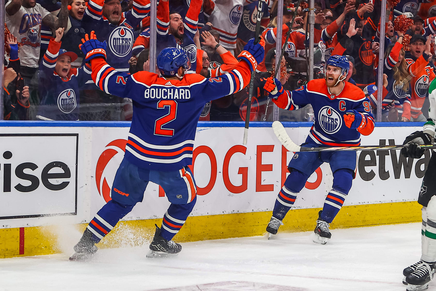 EDMONTON, AB - MAY 29: Edmonton Oilers Defenceman Evan Bouchard (2) and Edmonton Oilers Center Connor McDavid (97) celebrate a game tying goal in the first period of game three of the Western Conference Final Round Edmonton Oilers game versus the Dallas Stars on May 29, 2024 at Rogers Place in Edmonton, AB. (Photo by Curtis Comeau/Icon Sportswire via Getty Images)