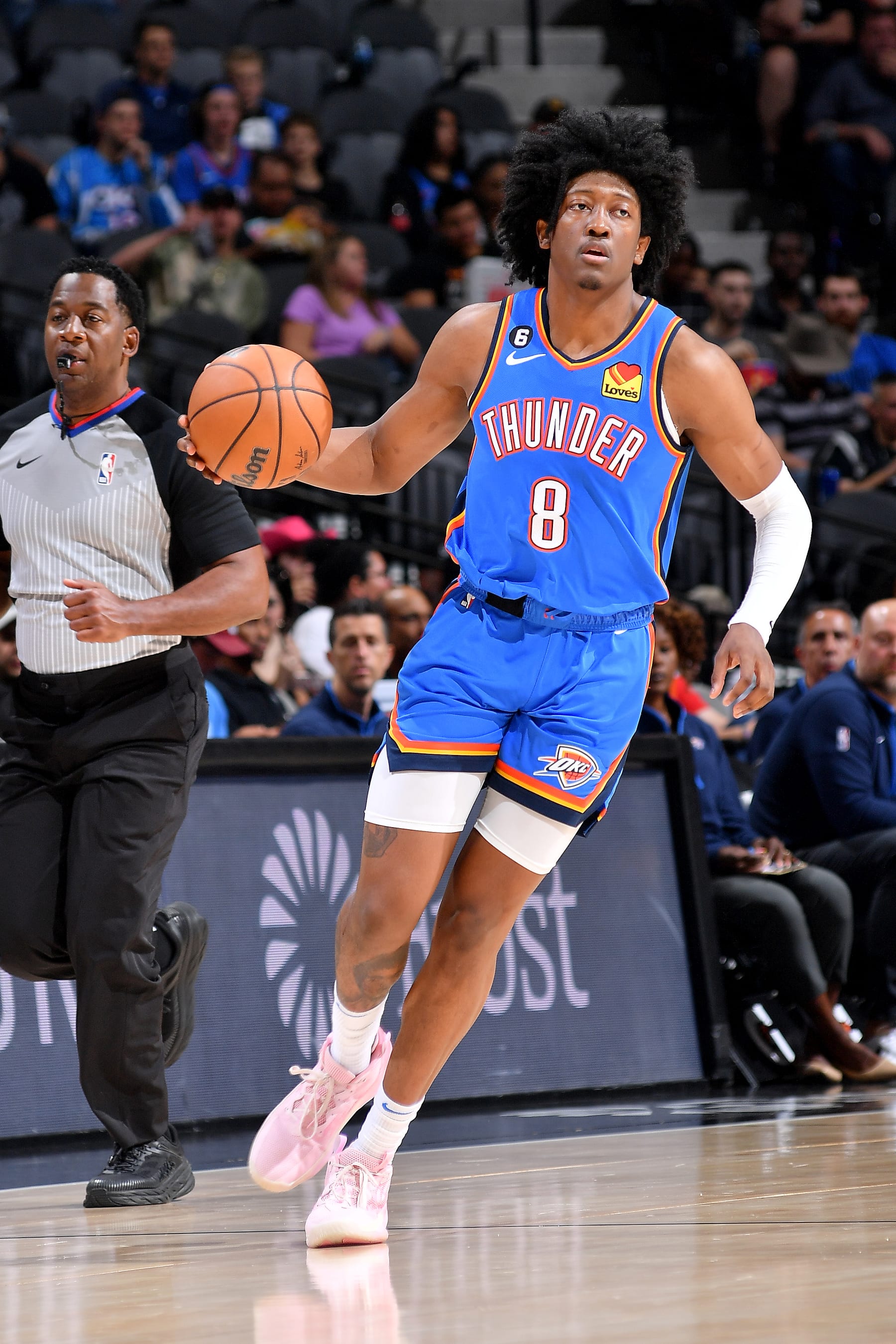 SAN ANTONIO, TX - OCTOBER 13: Jalen Williams #8 of the Oklahoma City Thunder dribbles the ball against the San Antonio Spurs during a preseason game on October 13, 2022 at the AT&T Center in San Antonio, Texas. NOTE TO USER: User expressly acknowledges and agrees that, by downloading and or using this photograph, user is consenting to the terms and conditions of the Getty Images License Agreement. Mandatory Copyright Notice: Copyright 2022 NBAE (Photos by Michael Gonzales/NBAE via Getty Images)