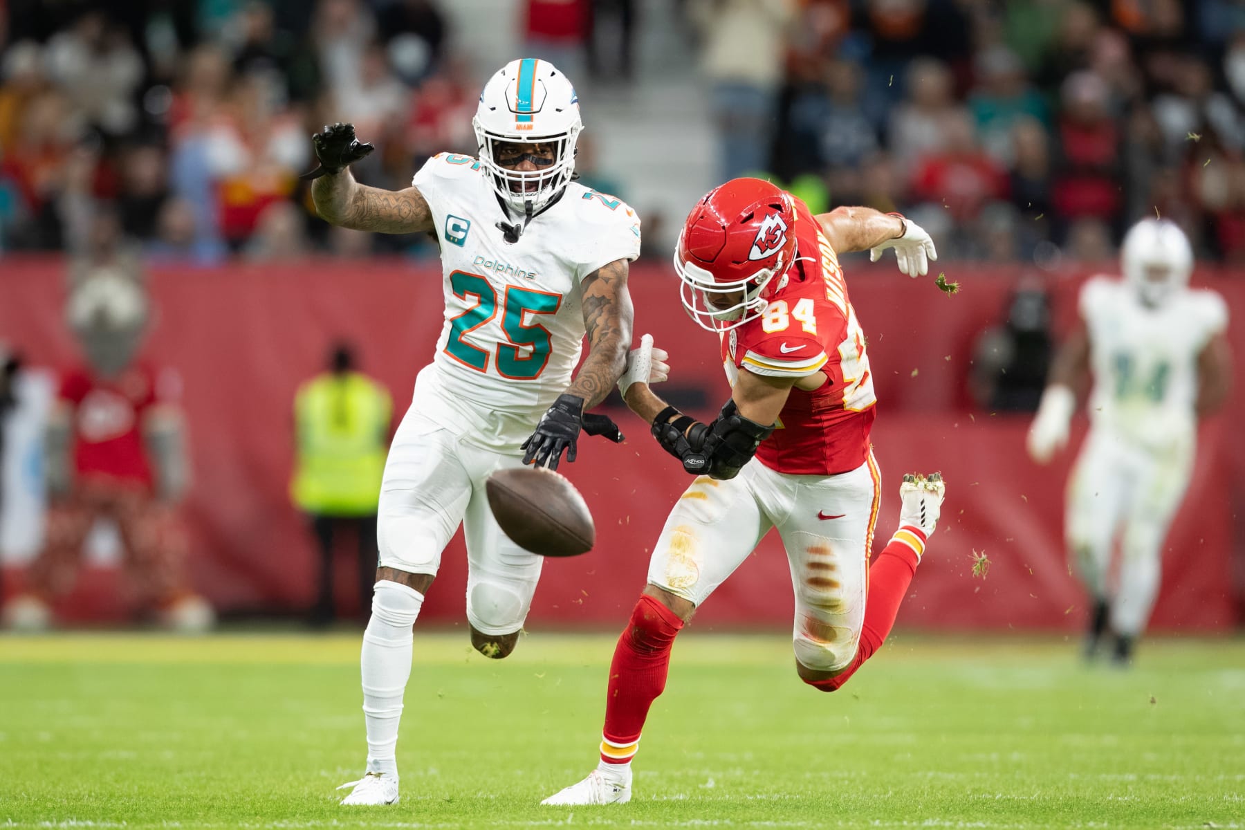 FRANKFURT AM MAIN, GERMANY - NOVEMBER 5: Xavien Howard of Miami Dolphins and Justin Watson of Kansas City Chiefs battle for the ball during the NFL match between Miami Dolphins and Kansas City Chiefs at Deutsche Bank Park on November 5, 2023 in Frankfurt am Main, Germany. (Photo by Mario Hommes/DeFodi Images via Getty Images)