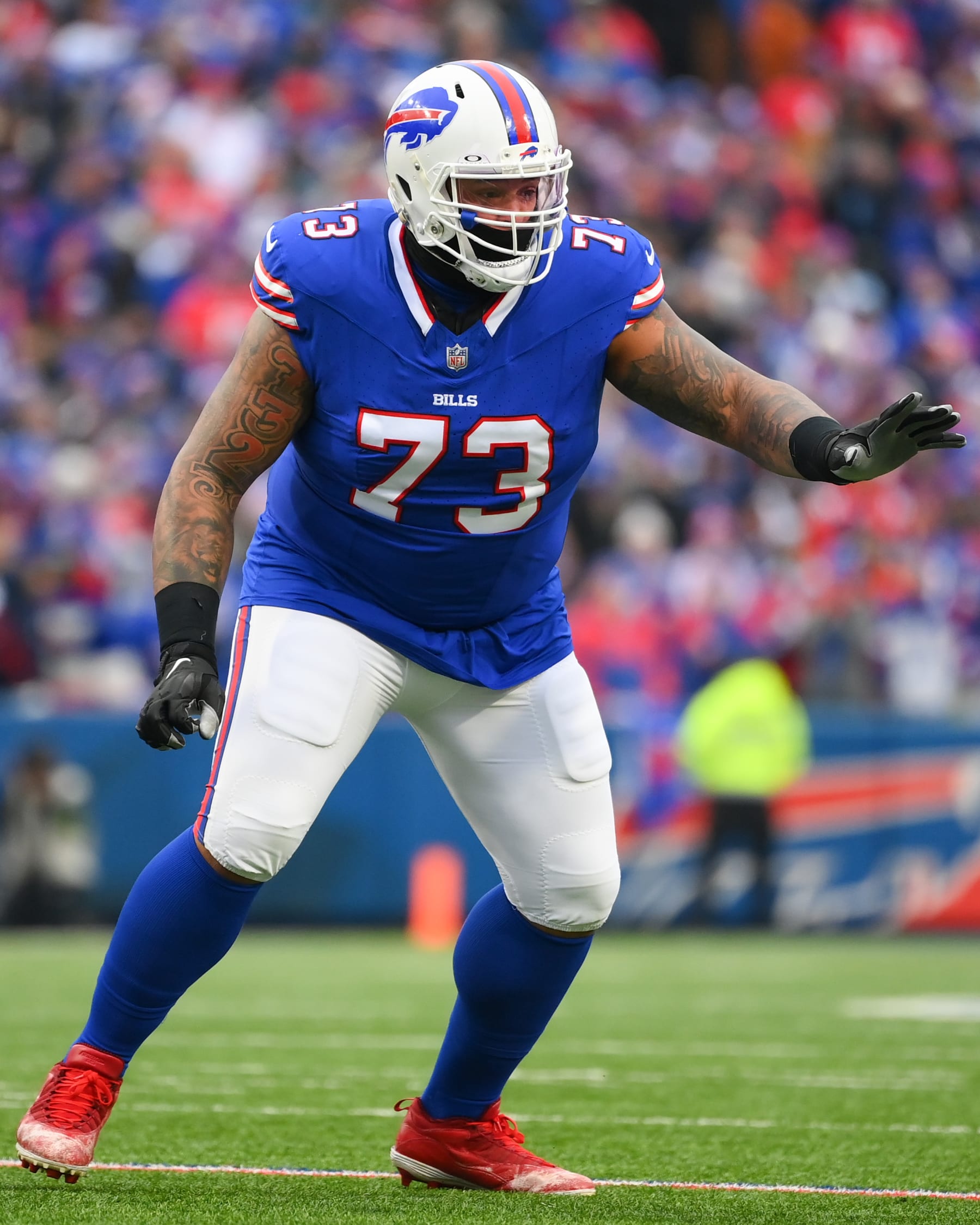 ORCHARD PARK, NEW YORK - DECEMBER 31: Dion Dawkins #73 of the Buffalo Bills in action against the New England Patriots during the first half at Highmark Stadium on December 31, 2023 in Orchard Park, New York. The Bills won 27-21. (Photo by Rich Barnes/Getty Images)