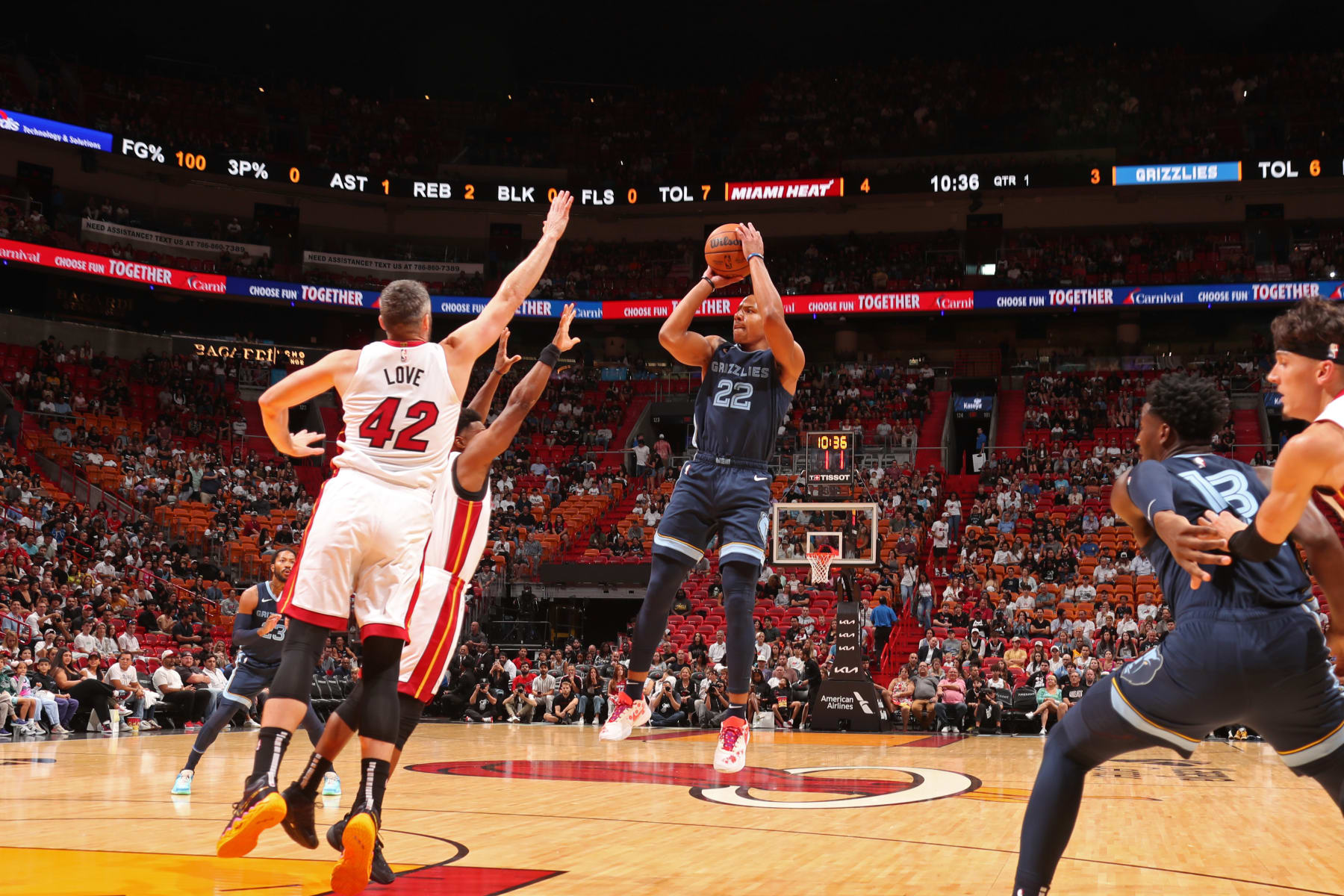 MIAMI, FL - OCTOBER 15: Desmond Bane #22 of the Memphis Grizzlies shoots a three point basket against the Miami Heat on October 15, 2023 at Kaseya Center in Miami, Florida. NOTE TO USER: User expressly acknowledges and agrees that, by downloading and or using this Photograph, user is consenting to the terms and conditions of the Getty Images License Agreement. Mandatory Copyright Notice: Copyright 2023 NBAE (Photo by Issac Baldizon/NBAE via Getty Images)