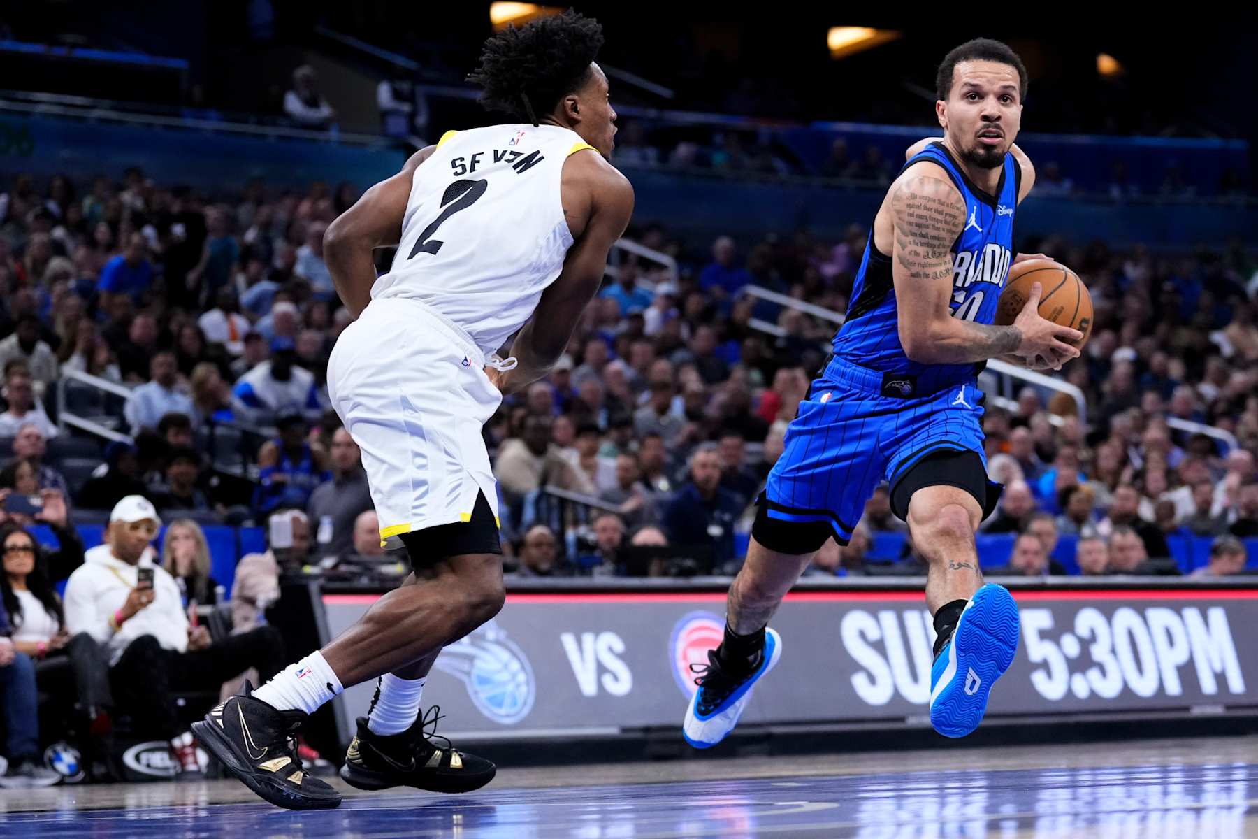 ORLANDO, FLORIDA - FEBRUARY 29: Cole Anthony #50 of the Orlando Magic dribbles the ball against Collin Sexton #2 of the Utah Jazz during the second quarter at Kia Center on February 29, 2024 in Orlando, Florida. NOTE TO USER: User expressly acknowledges and agrees that, by downloading and or using this photograph, user is consenting to the terms and conditions of the Getty Images License Agreement. (Photo by Rich Storry/Getty Images)