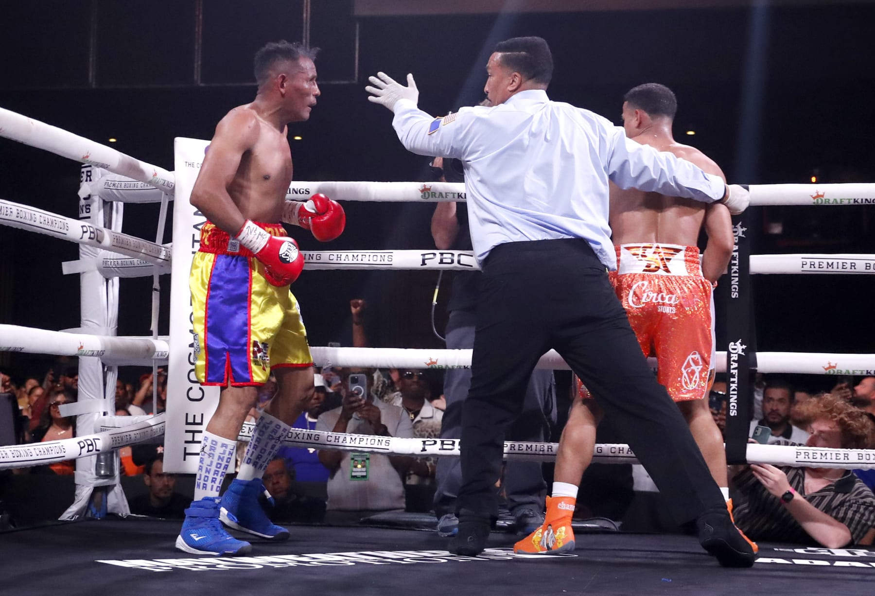 LAS VEGAS, NEVADA - MAY 13: Referee Tony Weeks steps in to stop the WBA super lightweight title fight between Ismael Barroso (L) and Rolando Romero in the ninth round at The Cosmopolitan of Las Vegas on May 13, 2023 in Las Vegas, Nevada. Romero beat Barroso with a ninth-round TKO to win the vacant title. (Photo by Steve Marcus/Getty Images)