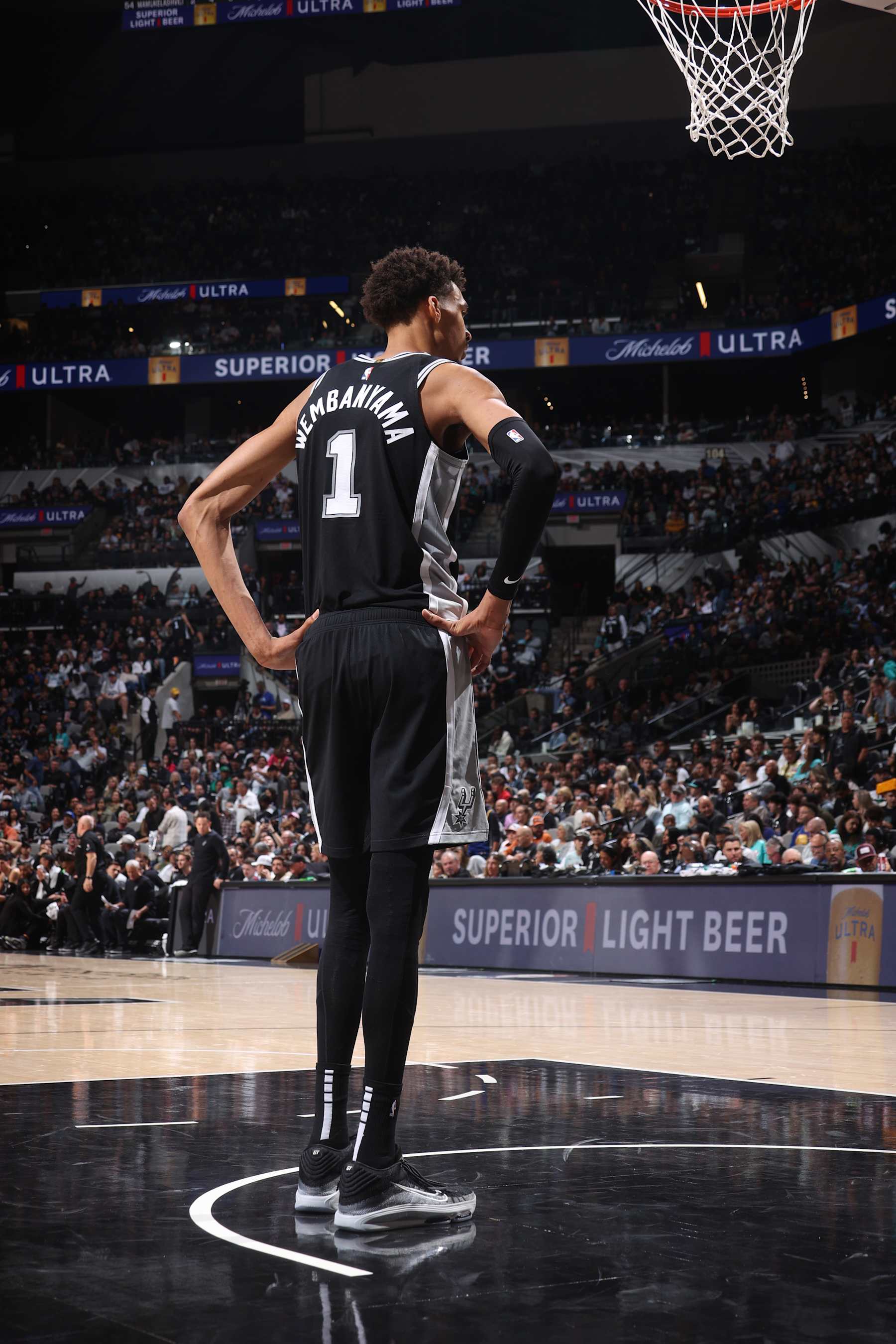 SAN ANTONIO, TX - NOVEMBER 23: Victor Wembanyama #1 of the San Antonio Spurs looks on during the game against the Golden State Warriors on November 23, 2024 at the Frost Bank Center in San Antonio, Texas. NOTE TO USER: User expressly acknowledges and agrees that, by downloading and or using this photograph, user is consenting to the terms and conditions of the Getty Images License Agreement. Mandatory Copyright Notice: Copyright 2024 NBAE (Photos by Nathaniel S. Butler/NBAE via Getty Images)