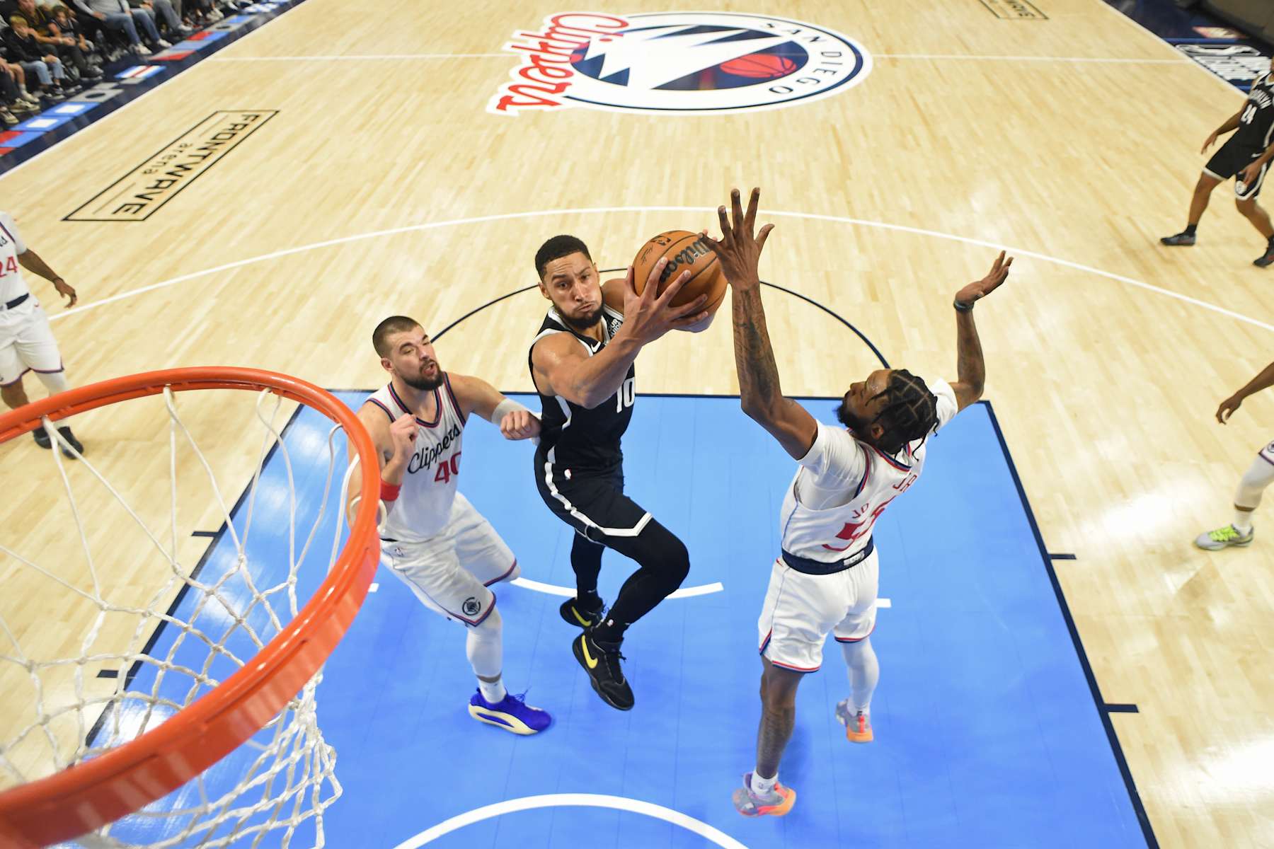 OCEANSIDE, CA - OCTOBER 8: Ben Simmons #10 of the Brooklyn Nets drives to the basket during the game against the LA Clippers during a NBA preseason game on October 8, 2024 at Frontwave Arena in Oceanside, California. NOTE TO USER: User expressly acknowledges and agrees that, by downloading and/or using this Photograph, user is consenting to the terms and conditions of the Getty Images License Agreement. Mandatory Copyright Notice: Copyright 2024 NBAE (Photo by Juan Ocampo/NBAE via Getty Images)