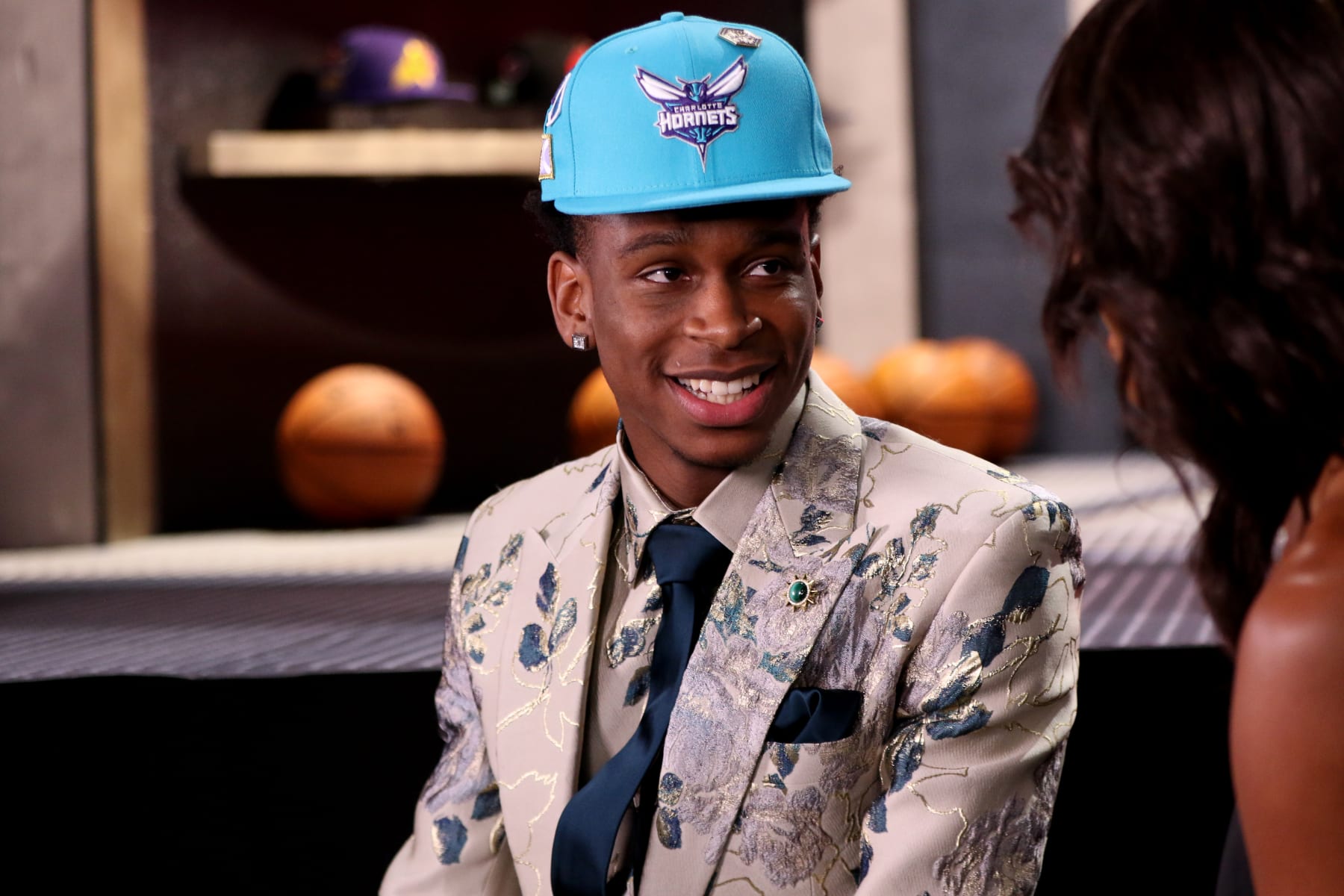 BROOKLYN, NY - JUNE 21:  Shai Gilgeous-Alexander talks to the media after being selected eleventh by the Charlotte Hornets on June 21, 2018 at Barclays Center during the 2018 NBA Draft in Brooklyn, New York.  NOTE TO USER: User expressly acknowledges and agrees that, by downloading and or using this photograph, User is consenting to the terms and conditions of the Getty Images License Agreement. Mandatory Copyright Notice: Copyright 2018 NBAE (Photo by Michael J. LeBrecht II/NBAE via Getty Images)
