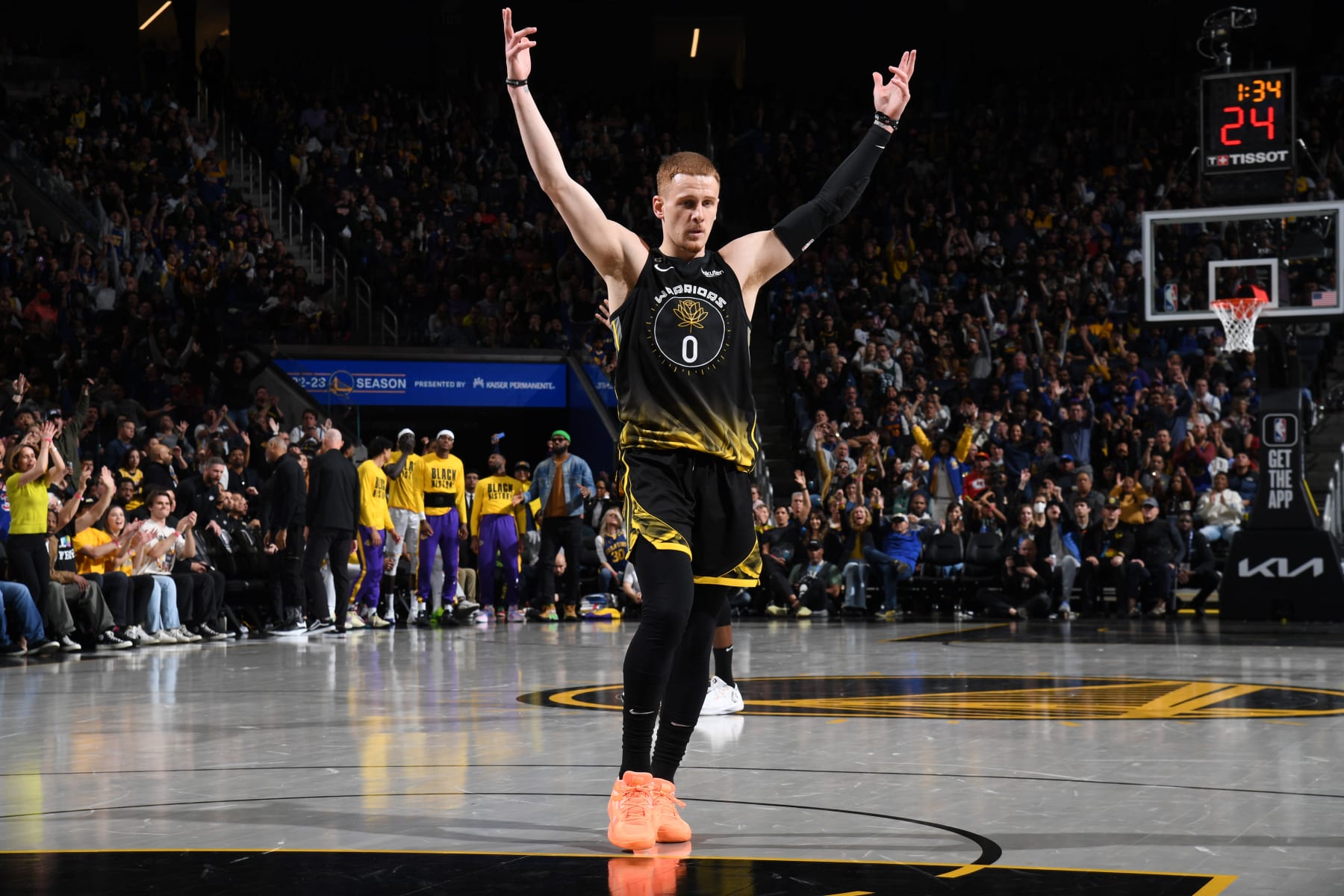 SAN FRANCISCO, CA - FEBRUARY 11: Donte DiVincenzo #0 of the Golden State Warriors celebrates a three point basket during the game against the Los Angeles Lakers on February 11, 2023 at Chase Center in San Francisco, California. NOTE TO USER: User expressly acknowledges and agrees that, by downloading and or using this photograph, user is consenting to the terms and conditions of Getty Images License Agreement. Mandatory Copyright Notice: Copyright 2023 NBAE (Photo by Noah Graham/NBAE via Getty Images)