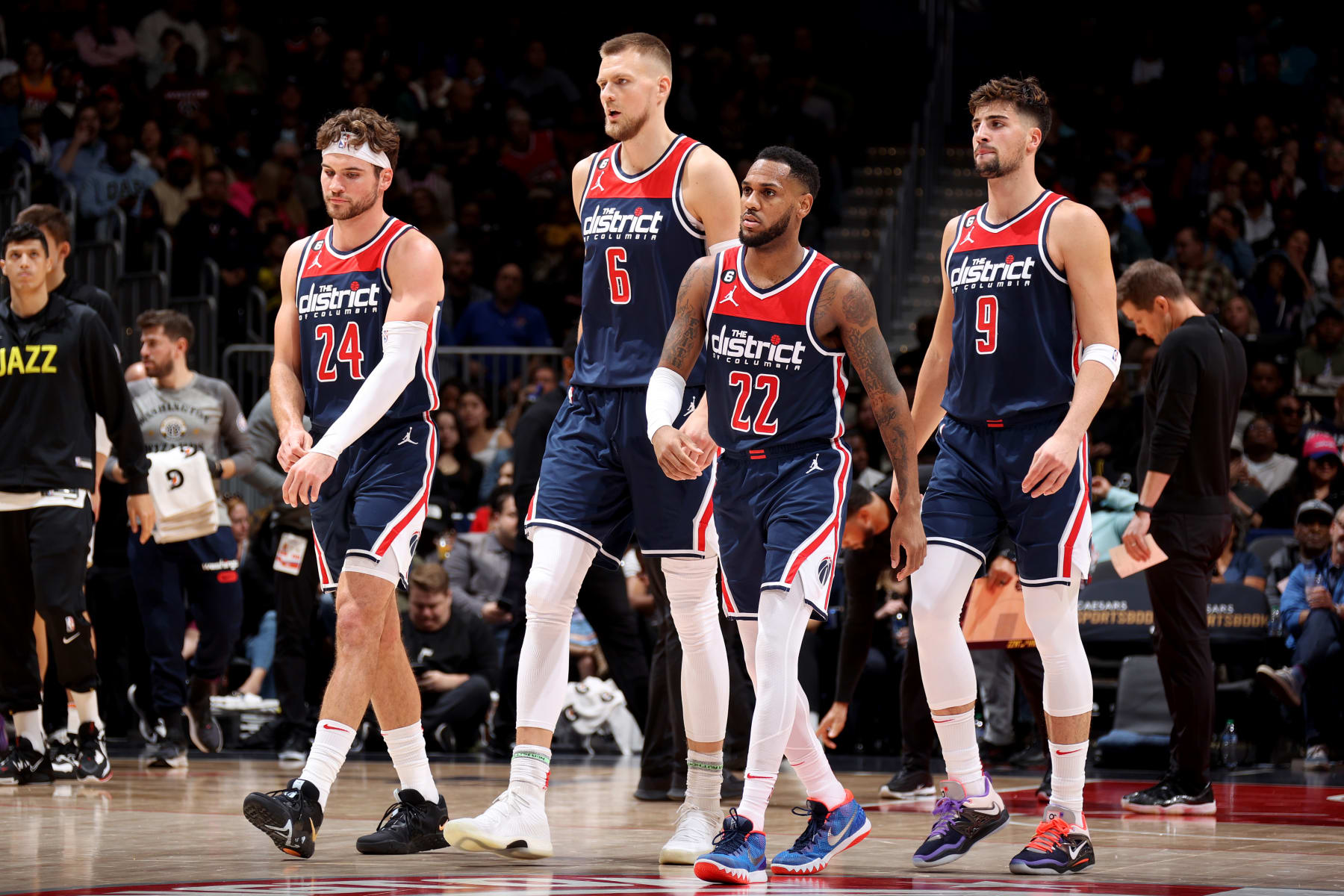 WASHINGTON, DC -  NOVEMBER 12: Corey Kispert #24, Kristaps Porzingis #6, Monte Morris #22, and Deni Avdija #9 of the Washington Wizards on the court during the game against the Utah Jazz  on November 12, 2022 at Capital One Arena in Washington, DC. NOTE TO USER: User expressly acknowledges and agrees that, by downloading and or using this Photograph, user is consenting to the terms and conditions of the Getty Images License Agreement. Mandatory Copyright Notice: Copyright 2022 NBAE (Photo by Stephen Gosling/NBAE via Getty Images)