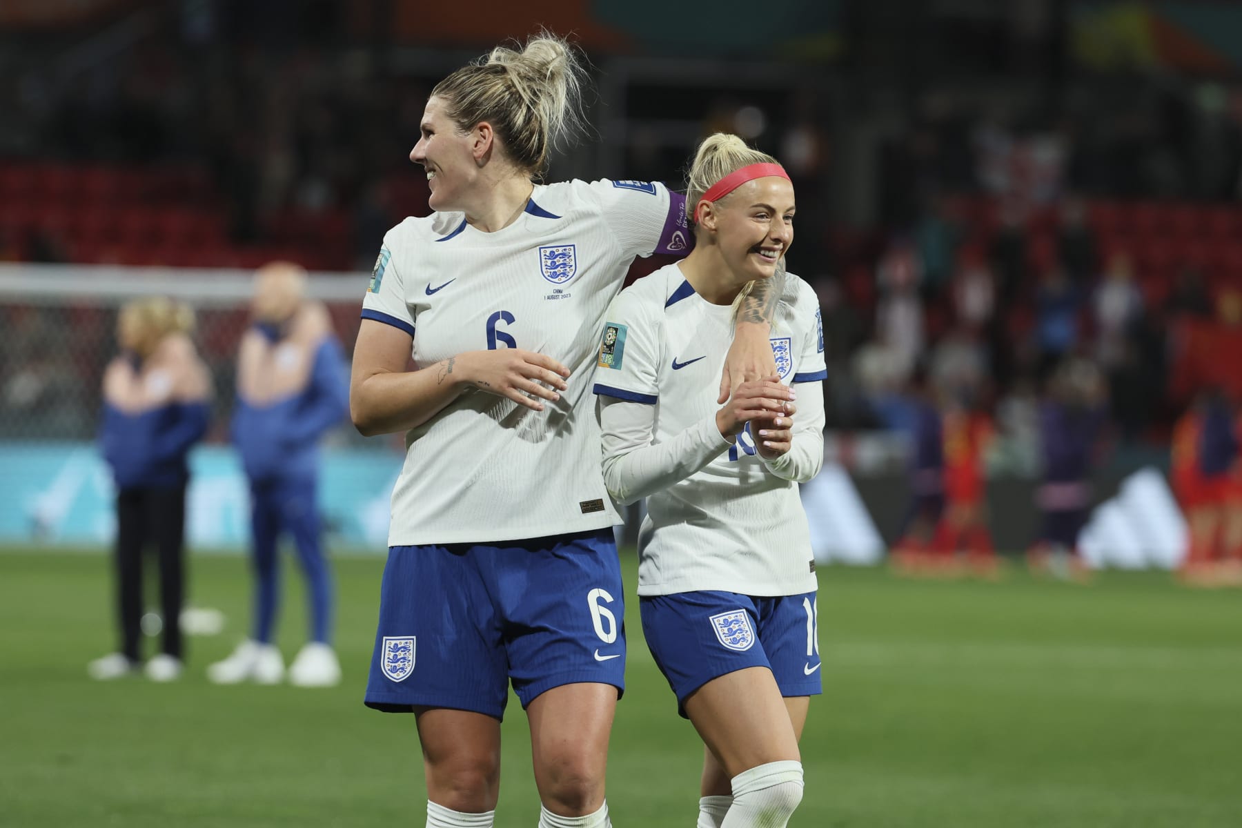 England's Millie Bright, left, celebrate with England's Chloe Kelly after the Women's World Cup Group D soccer match between China and England 