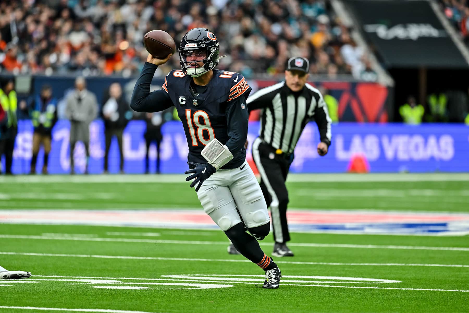 London, United Kingdom - October 13: Caleb Williams of Chicago Bears controls the ball during the NFL match between Jacksonville Jaguars and Chicago Bears at Tottenham Hotspur Stadium on October 13, 2024 in London, England. (Photo by Vince Mignott/DeFodi Images via Getty Images)