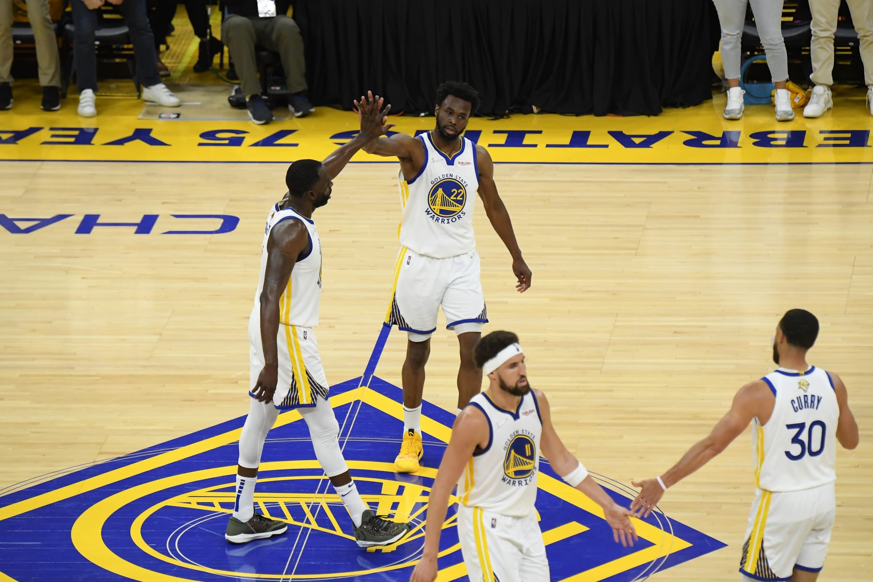SAN FRANCISCO, CA - JUNE 2: Draymond Green #23 of the Golden State Warriors high fives Andrew Wiggins #22 during Game One of the 2022 NBA Finals on June 2, 2022 at Chase Center in San Francisco, California. NOTE TO USER: User expressly acknowledges and agrees that, by downloading and or using this photograph, user is consenting to the terms and conditions of Getty Images License Agreement. Mandatory Copyright Notice: Copyright 2022 NBAE (Photo by Brian Babineau/NBAE via Getty Images)