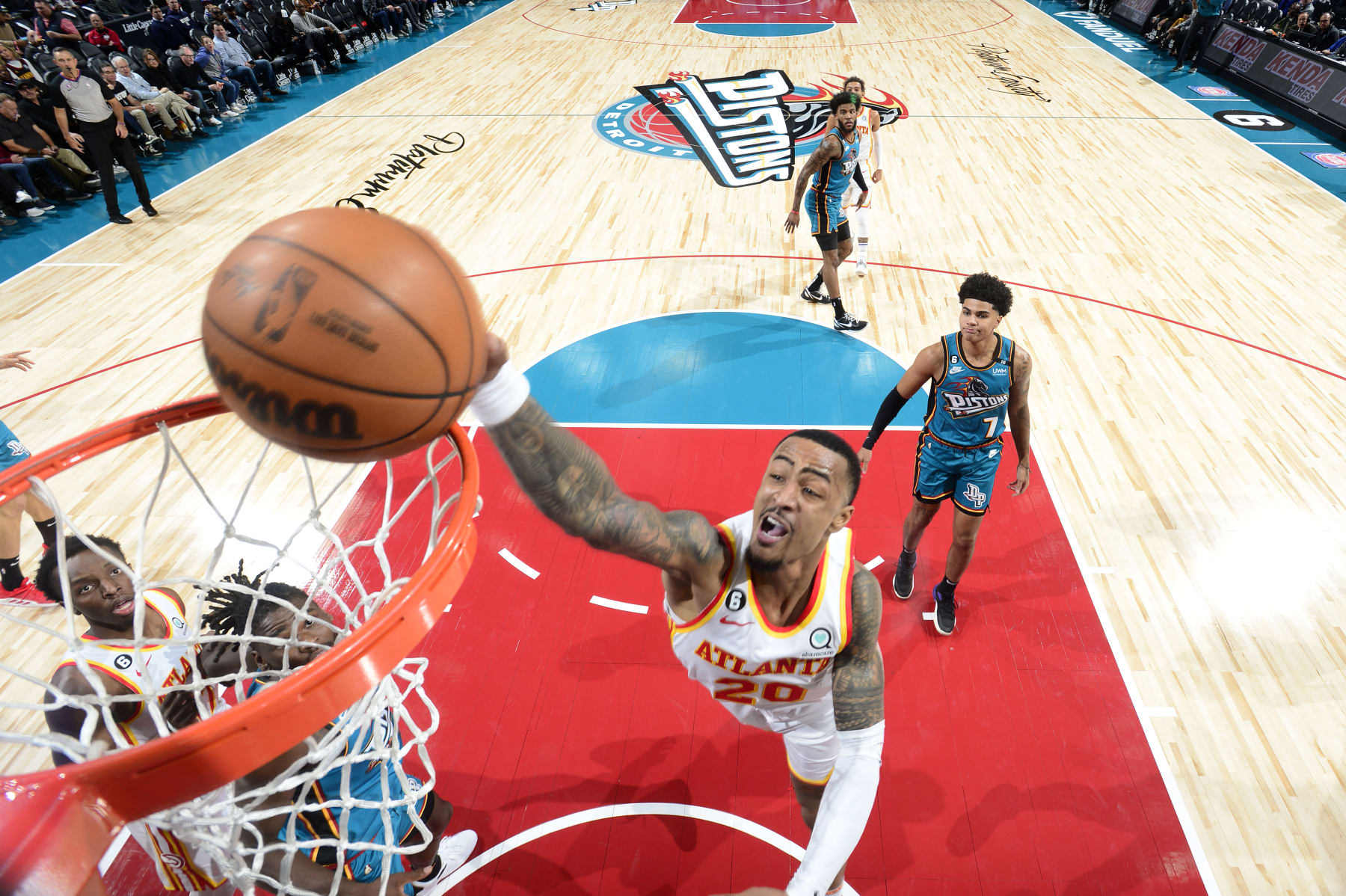 DETROIT, MI - OCTOBER 28: John Collins #20 of the Atlanta Hawks drives to the basket against the Portland Trail Blazers  on October 28, 2022 at Little Caesars Arena in Detroit, Michigan. NOTE TO USER: User expressly acknowledges and agrees that, by downloading and/or using this photograph, User is consenting to the terms and conditions of the Getty Images License Agreement. Mandatory Copyright Notice: Copyright 2022 NBAE (Photo by Chris Schwegler/NBAE via Getty Images)