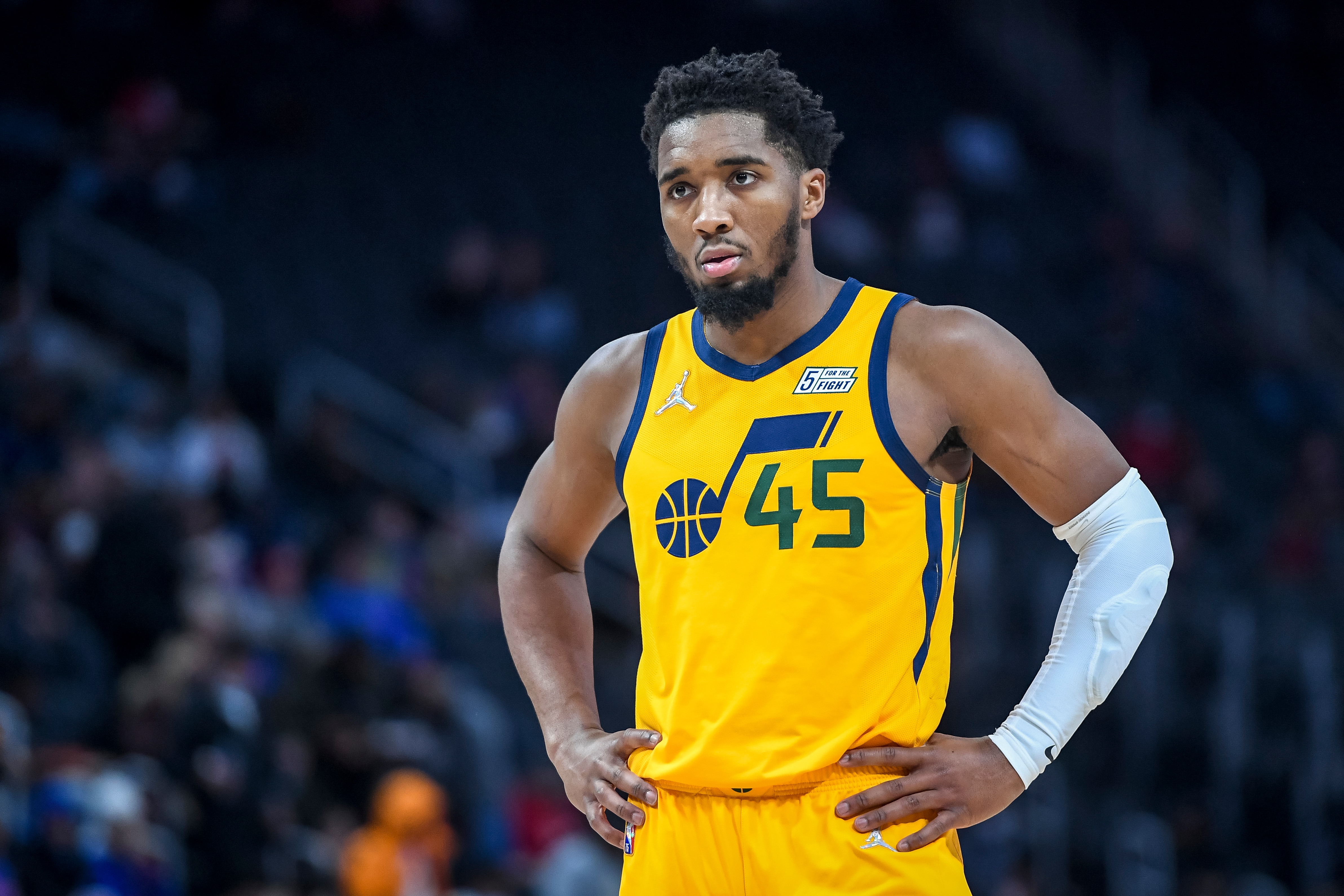 DETROIT, MICHIGAN - JANUARY 10: Donovan Mitchell #45 of the Utah Jazz looks on against the Detroit Pistons during the third quarter at Little Caesars Arena on January 10, 2022 in Detroit, Michigan. NOTE TO USER: User expressly acknowledges and agrees that, by downloading and or using this photograph, User is consenting to the terms and conditions of the Getty Images License Agreement. (Photo by Nic Antaya/Getty Images)