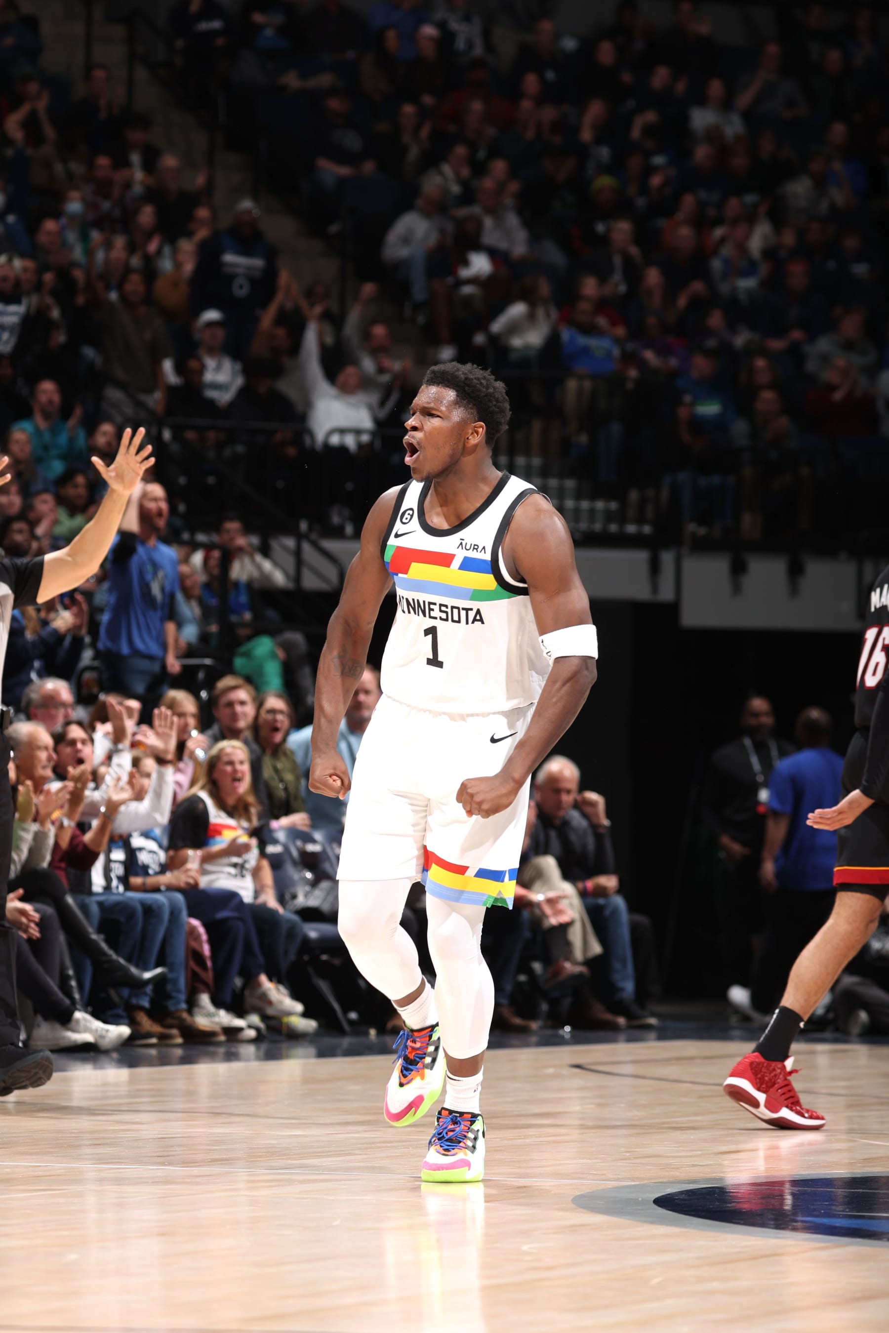 MINNEAPOLIS, MN -  NOVEMBER 21: Anthony Edwards #1 of the Minnesota Timberwolves reacts to a play during the game against the Miami Heat on November 21, 2022 at Target Center in Minneapolis, Minnesota. NOTE TO USER: User expressly acknowledges and agrees that, by downloading and or using this Photograph, user is consenting to the terms and conditions of the Getty Images License Agreement. Mandatory Copyright Notice: Copyright 2022 NBAE (Photo by David Sherman/NBAE via Getty Images)