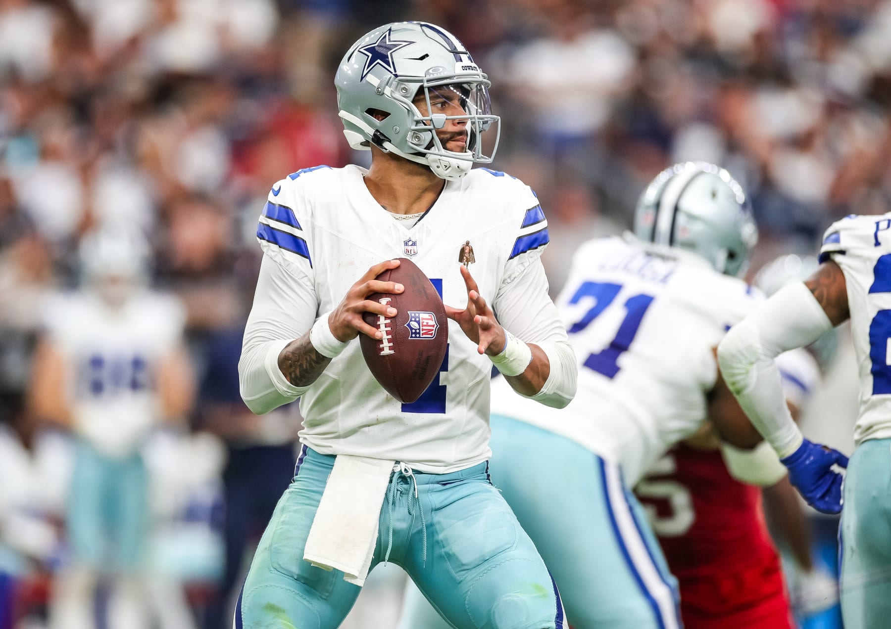 GLENDALE, ARIZONA - SEPTEMBER 24: Dak Prescott #4 of the Dallas Cowboys looks to pass in the fourth quarter of a game against the Arizona Cardinals at State Farm Stadium on September 24, 2023 in Glendale, Arizona. (Photo by Mike Christy/Getty Images)