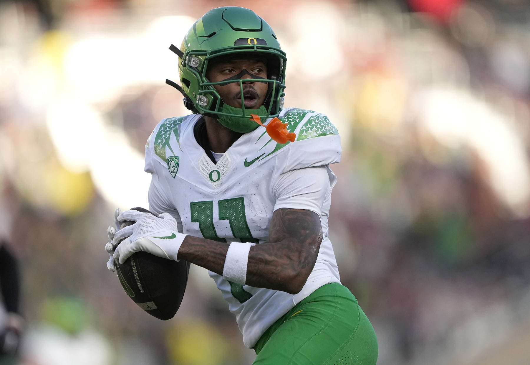 STANFORD, CALIFORNIA - SEPTEMBER 30: Troy Franklin #11 of the Oregon Ducks scores on a forty six yard pass play against the Stanford Cardinal in the third quarter of an NCAA football game at Stanford Stadium on September 30, 2023 in Stanford, California. (Photo by Thearon W. Henderson/Getty Images)