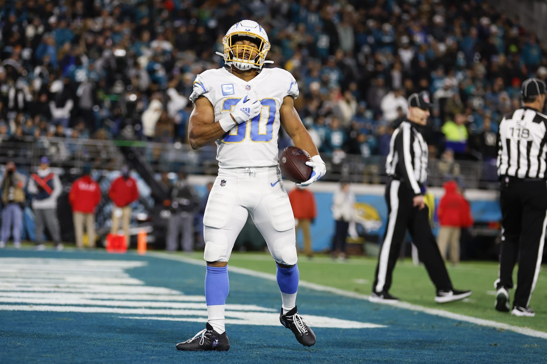 JACKSONVILLE, FL - JANUARY 14: Los Angeles Chargers running back Austin Ekeler (30) reacts after scoring a touchdown during the game between the Los Angeles Chargers and the Jacksonville Jaguars on January 14, 2023 at TIAA Bank Field in Jacksonville, Fl. (Photo by David Rosenblum/Icon Sportswire via Getty Images)