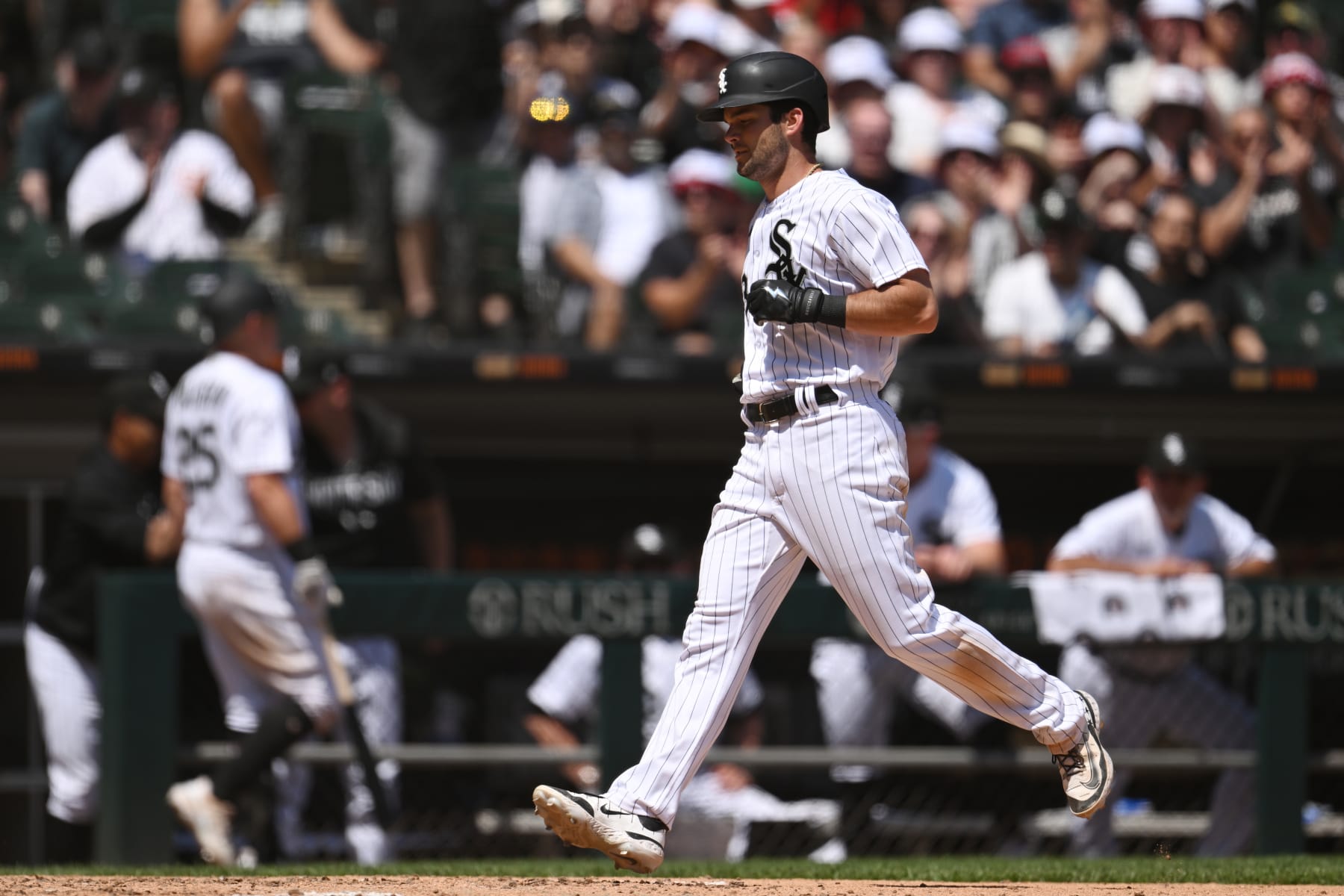 CHICAGO, ILLINOIS - JUNE 03: Andrew Benintendi #23 of the Chicago White Sox scores on a wild pitch in the fourth inning against the Detroit Tigers/ at Guaranteed Rate Field on June 03, 2023 in Chicago, Illinois. (Photo by Quinn Harris/Getty Images)