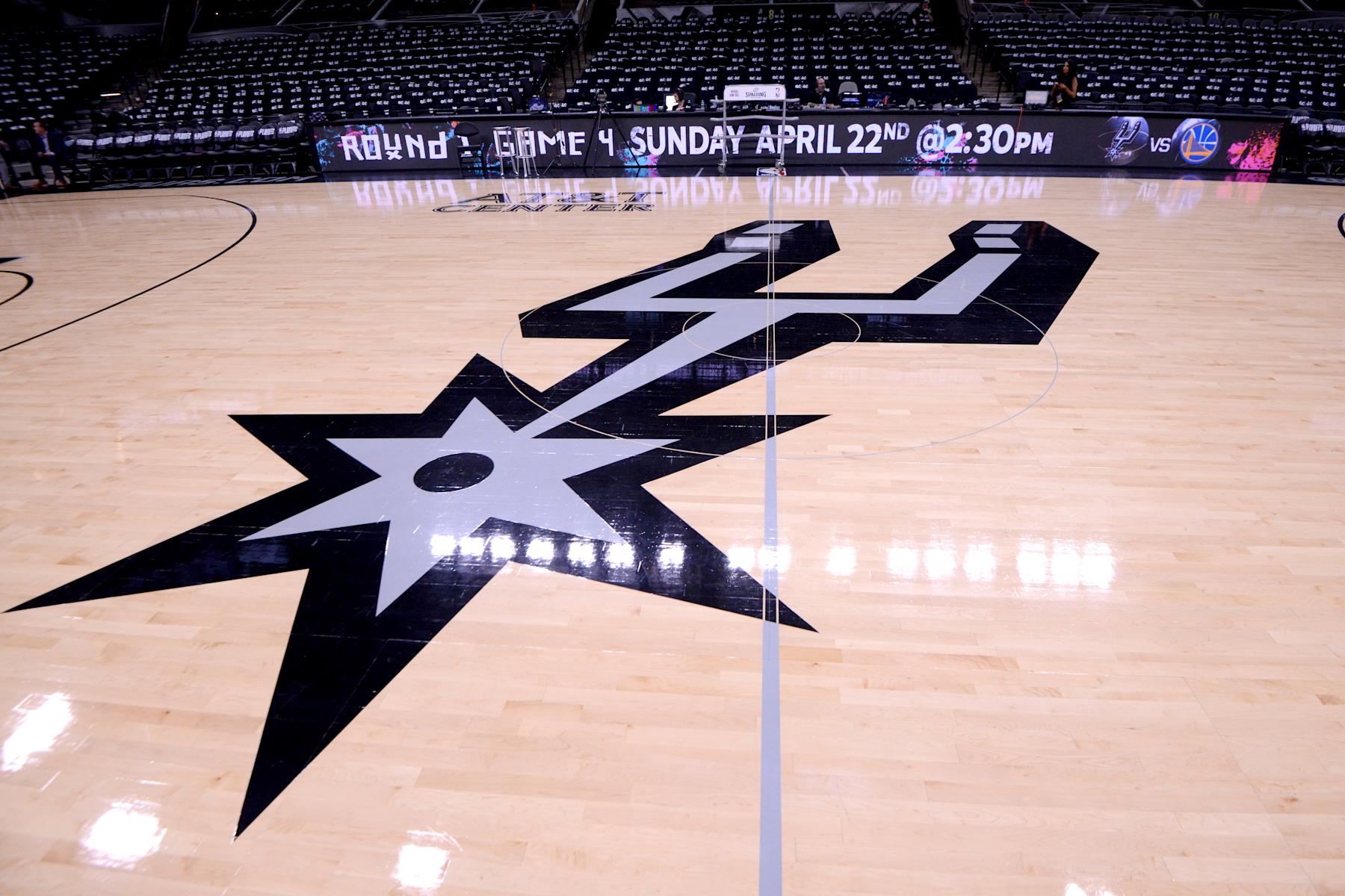 SAN ANTONIO, TX - APRIL 19:  The San Antonio Spurs logo is seen before the game against the Golden State Warriors in Game Three of Round One of the 2018 NBA Playoffs on April 19, 2018 at the AT&T Center in San Antonio, Texas. NOTE TO USER: User expressly acknowledges and agrees that, by downloading and or using this photograph, user is consenting to the terms and conditions of the Getty Images License Agreement. Mandatory Copyright Notice: Copyright 2018 NBAE (Photos by Noah Graham/NBAE via Getty Images)
