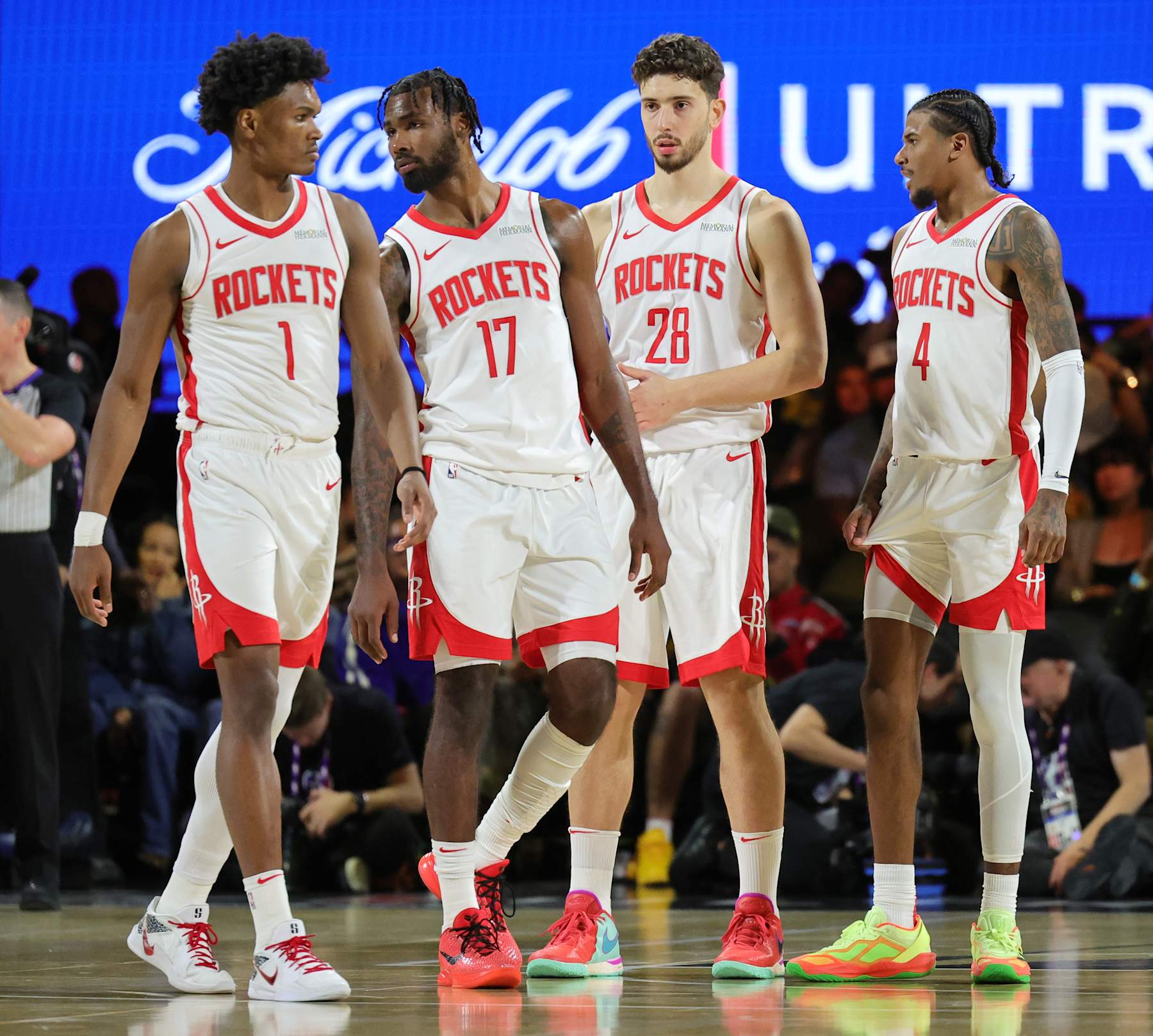 LAS VEGAS, NEVADA - DECEMBER 14: Amen Thompson #1, Tari Eason #17, Alperen Sengun #28 and Jalen Green #4 of the Houston Rockets walk on the court after a timeout in the first half of a semifinal game of the Emirates NBA Cup against the Oklahoma City Thunder at T-Mobile Arena on December 14, 2024 in Las Vegas, Nevada. The Thunder defeated the Rockets 111-96. NOTE TO USER: User expressly acknowledges and agrees that, by downloading and or using this photograph, User is consenting to the terms and conditions of the Getty Images License Agreement. (Photo by Ethan Miller/Getty Images)