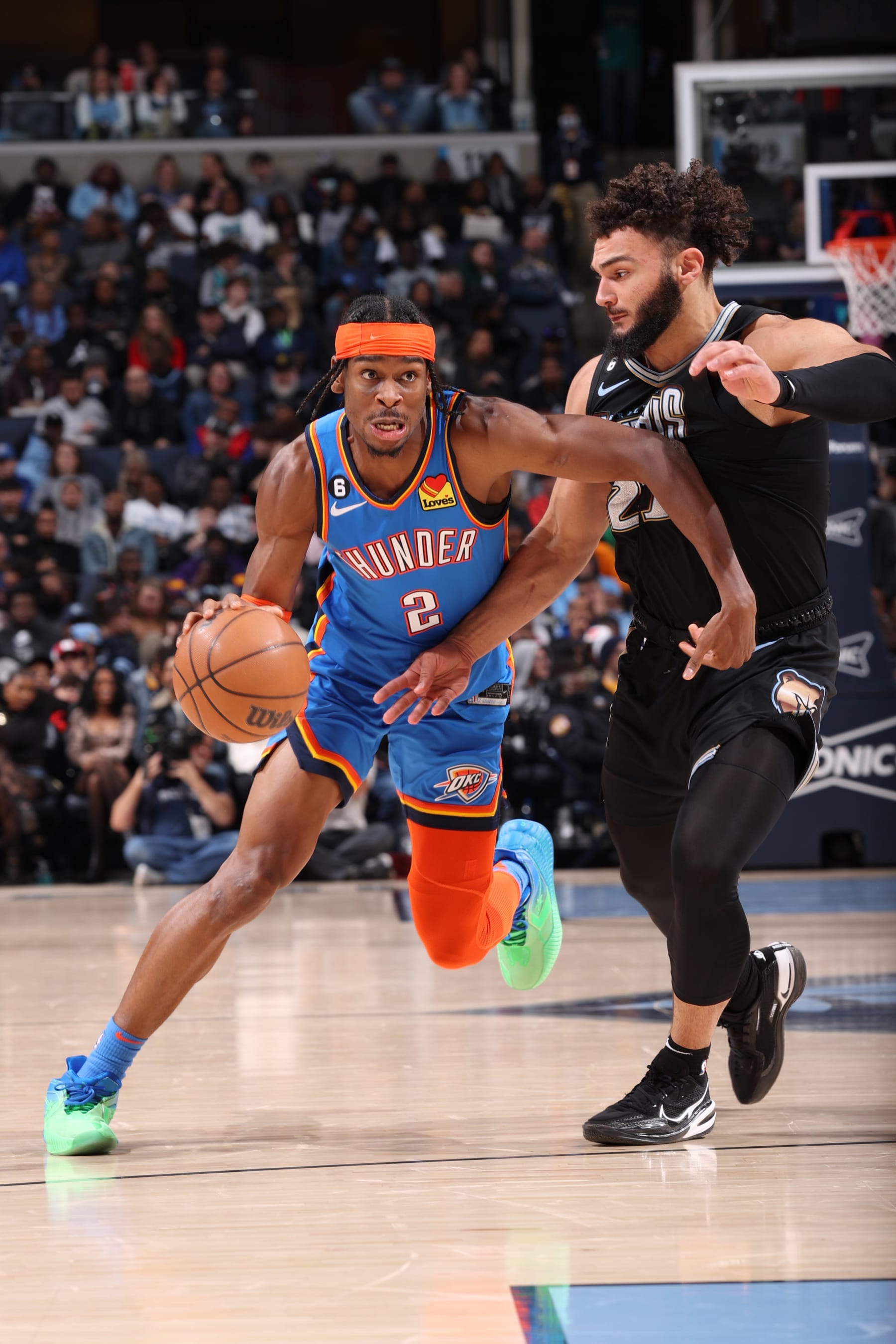 MEMPHIS, TN - NOVEMBER 18: Shai Gilgeous-Alexander #2 of the Oklahoma City Thunder dribbles the ball during the game against the Memphis Grizzlies on November 18, 2022 at FedExForum in Memphis, Tennessee. NOTE TO USER: User expressly acknowledges and agrees that, by downloading and or using this photograph, User is consenting to the terms and conditions of the Getty Images License Agreement. Mandatory Copyright Notice: Copyright 2022 NBAE (Photo by Joe Murphy/NBAE via Getty Images)