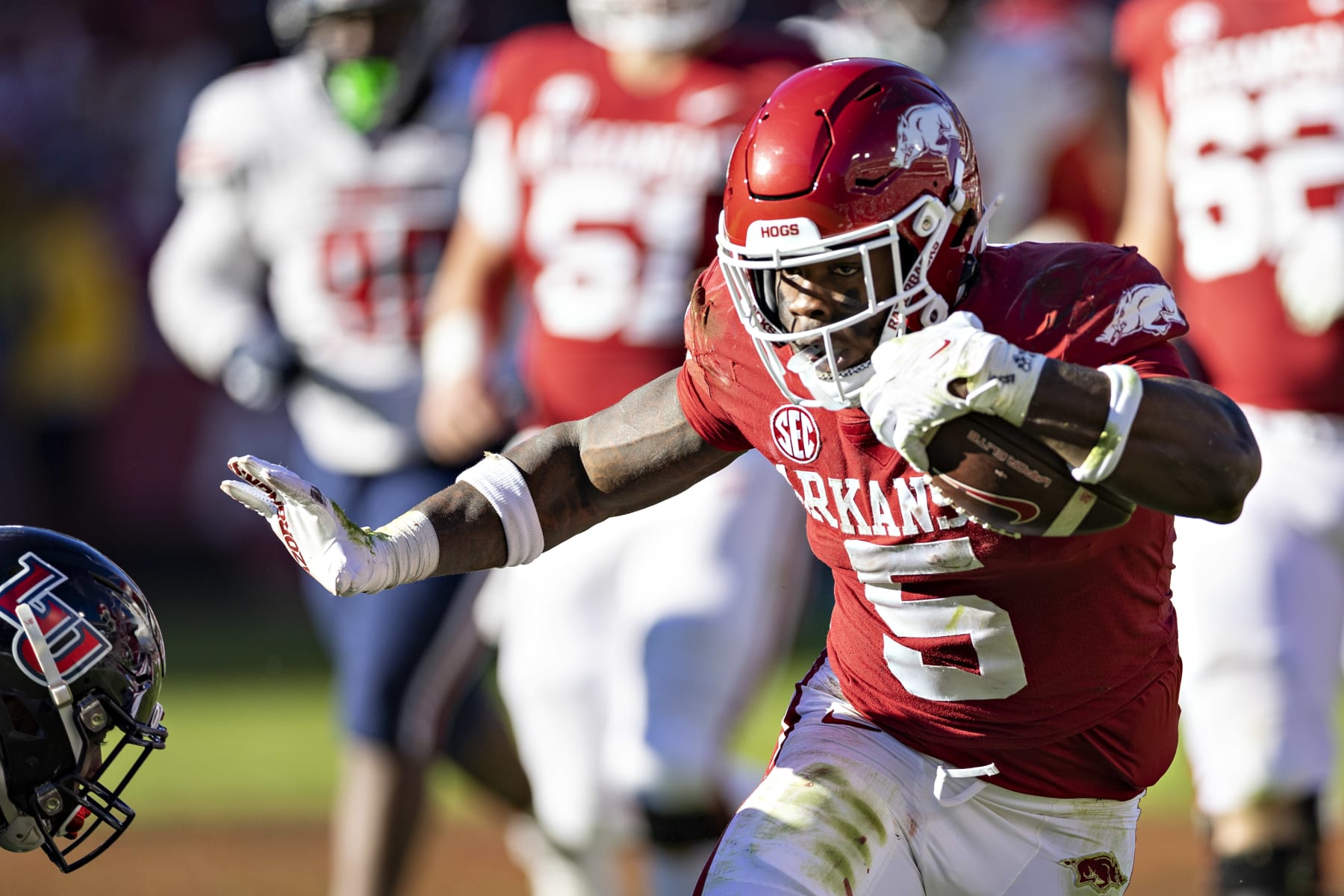 FAYETTEVILLE, ARKANSAS - NOVEMBER 05: Raheim Sanders #5 of the Arkansas Razorbacks runs the ball during a game against the Liberty Flames at Donald W. Reynolds Razorback Stadium on November 5, 2022 in Fayetteville, Arkansas. The Flames defeated the Razorbacks 21-19.  (Photo by Wesley Hitt/Getty Images)