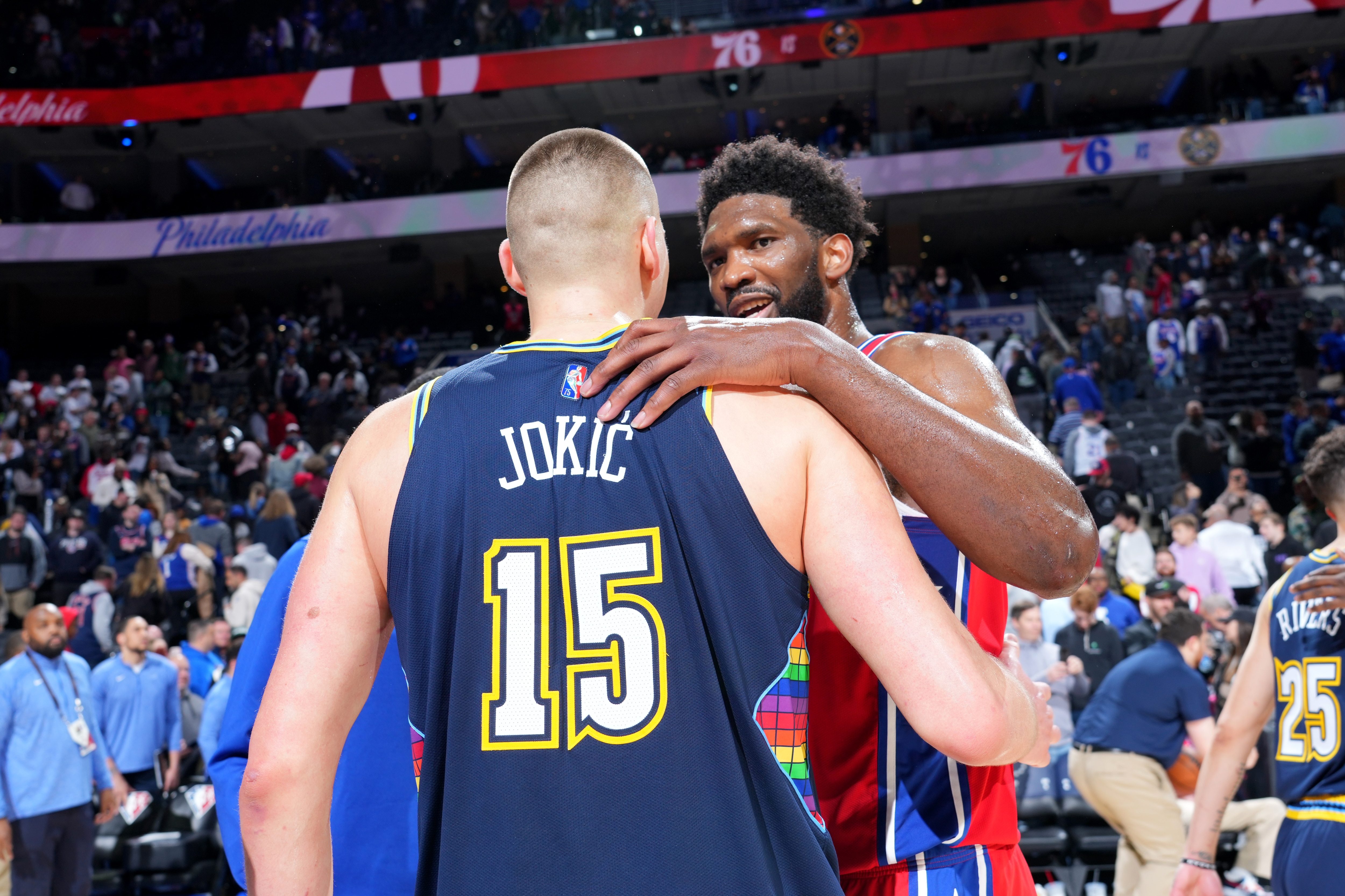 PHILADELPHIA, PA - MARCH 14: Nikola Jokic #15 of the Denver Nuggets and Joel Embiid #21 of the Philadelphia 76ers talk after a game on March 14, 2022 at Wells Fargo Center in Philadelphia, Pennsylvania. NOTE TO USER: User expressly acknowledges and agrees that, by downloading and/or using this Photograph, user is consenting to the terms and conditions of the Getty Images License Agreement. Mandatory Copyright Notice: Copyright 2022 NBAE (Photo by Jesse D. Garrabrant/NBAE via Getty Images)
