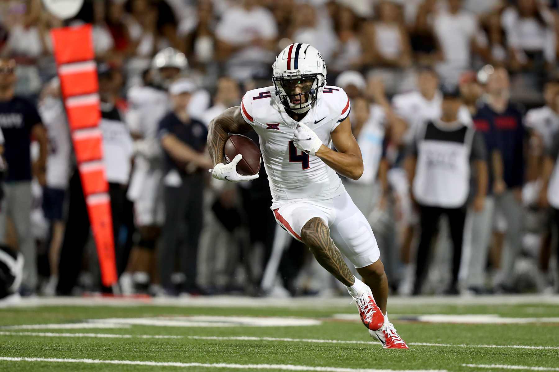 TUCSON, AZ - AUGUST 31: Arizona Wildcats wide receiver Tetairoa McMillan #4, during the second half of a football game between the New Mexico Lobos and the University of Arizona Wildcats.  August 31, 2024 at Arizona Stadium in Tucson, AZ. (Photo by Christopher Hook/Icon Sportswire via Getty Images)