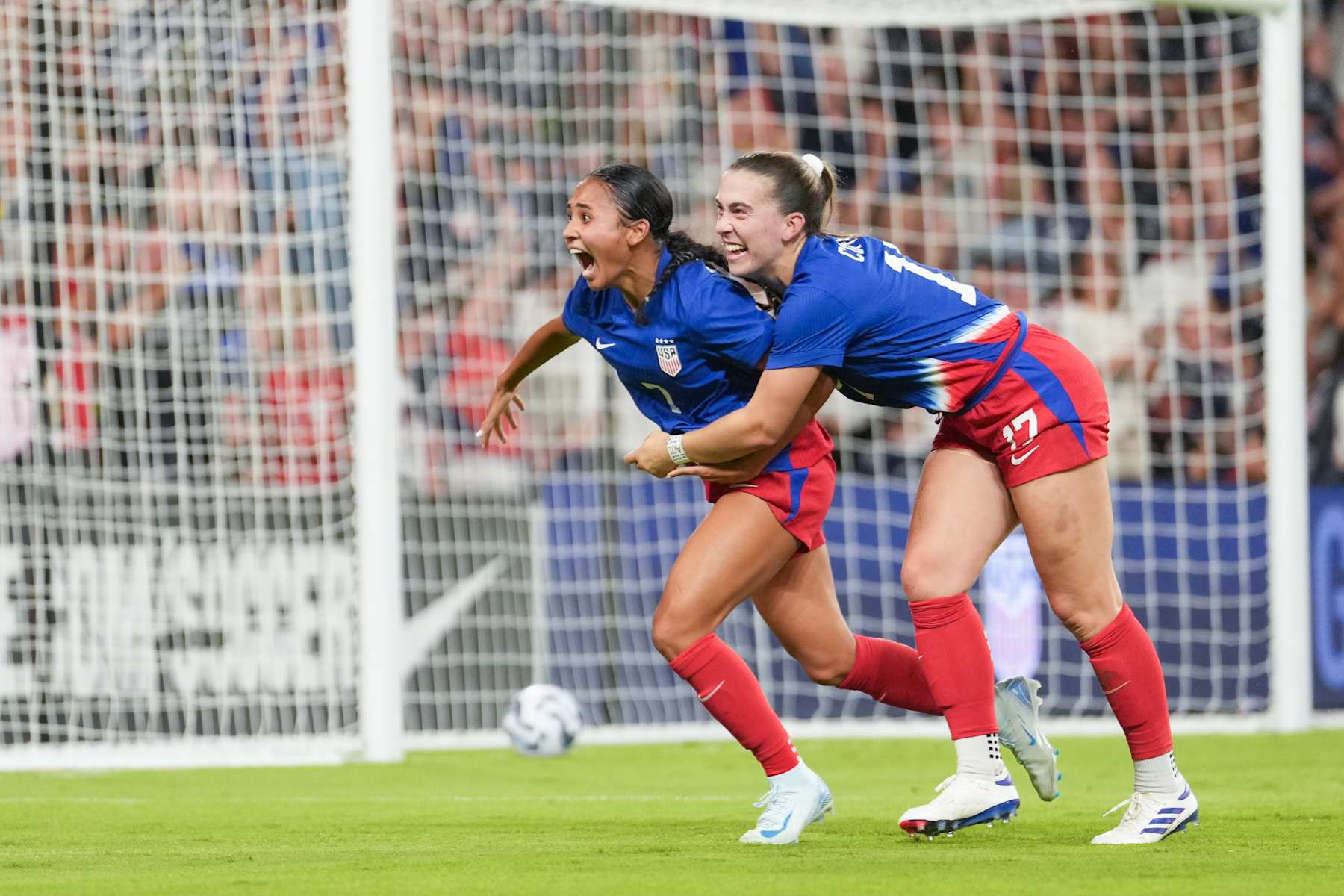 AUSTIN, TEXAS - OCTOBER 24: Alyssa Thompson #7 of the United States celebrates scoring with Sam Coffey #17 during the first half against Iceland at Q2 Stadium on October 24, 2024 in Austin, Texas. (Photo by Brad Smith/ISI Photos/USSF/Getty Images for USSF)