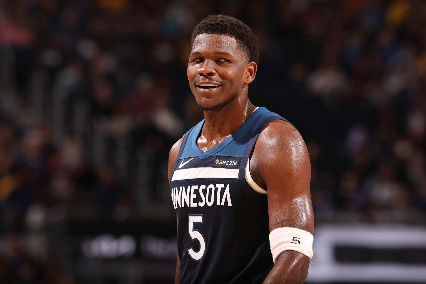 SAN FRANCISCO, CA - DECEMBER 8: Anthony Edwards #5 of the Minnesota Timberwolves smiles during the game against the Golden State Warriors on October 22, 2024 at Chase Center in San Francisco, California. NOTE TO USER: User expressly acknowledges and agrees that, by downloading and or using this photograph, user is consenting to the terms and conditions of Getty Images License Agreement. Mandatory Copyright Notice: Copyright 2024 NBAE (Photo by Jed Jacobsohn/NBAE via Getty Images)