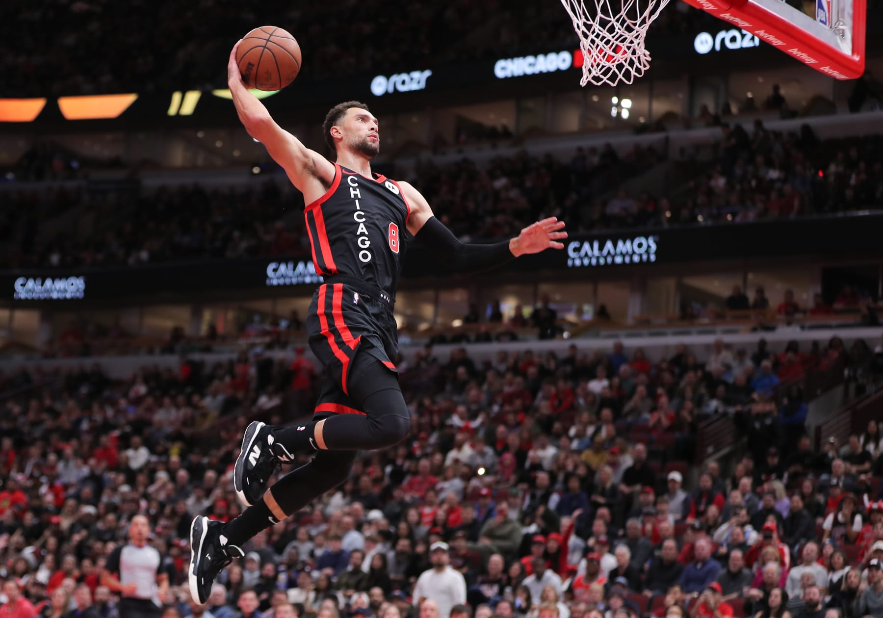 CHICAGO, IL - NOVEMBER 03: Chicago Bulls guard Zach LaVine (8) drives to the basket for a slam dunk during the first half of a NBA In-Season Tournament between the Brooklyn Nets and the Chicago Bulls on November 3, 2023 at the United Center in Chicago, IL. (Photo by Melissa Tamez/Icon Sportswire via Getty Images)
