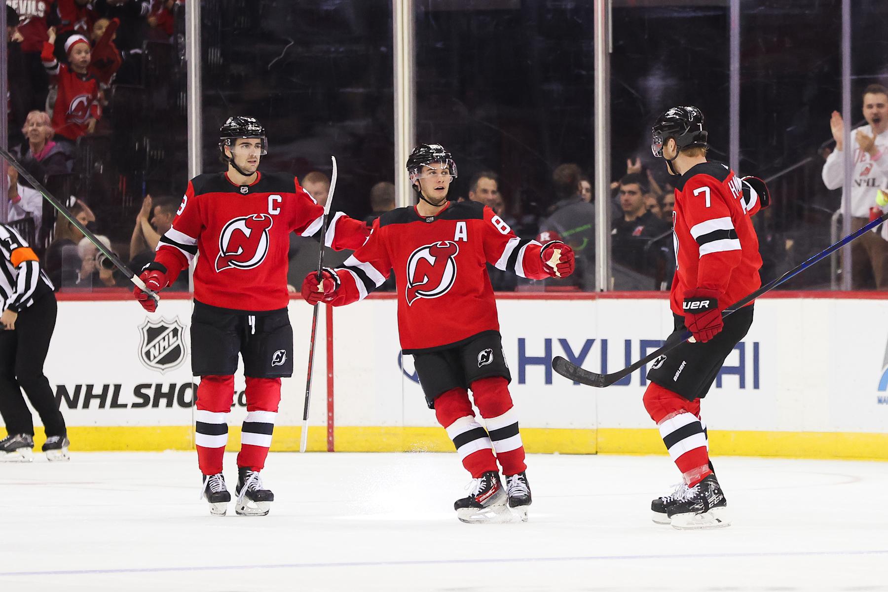 Nico Hischier, Jack Hughes and Dougie Hamilton.