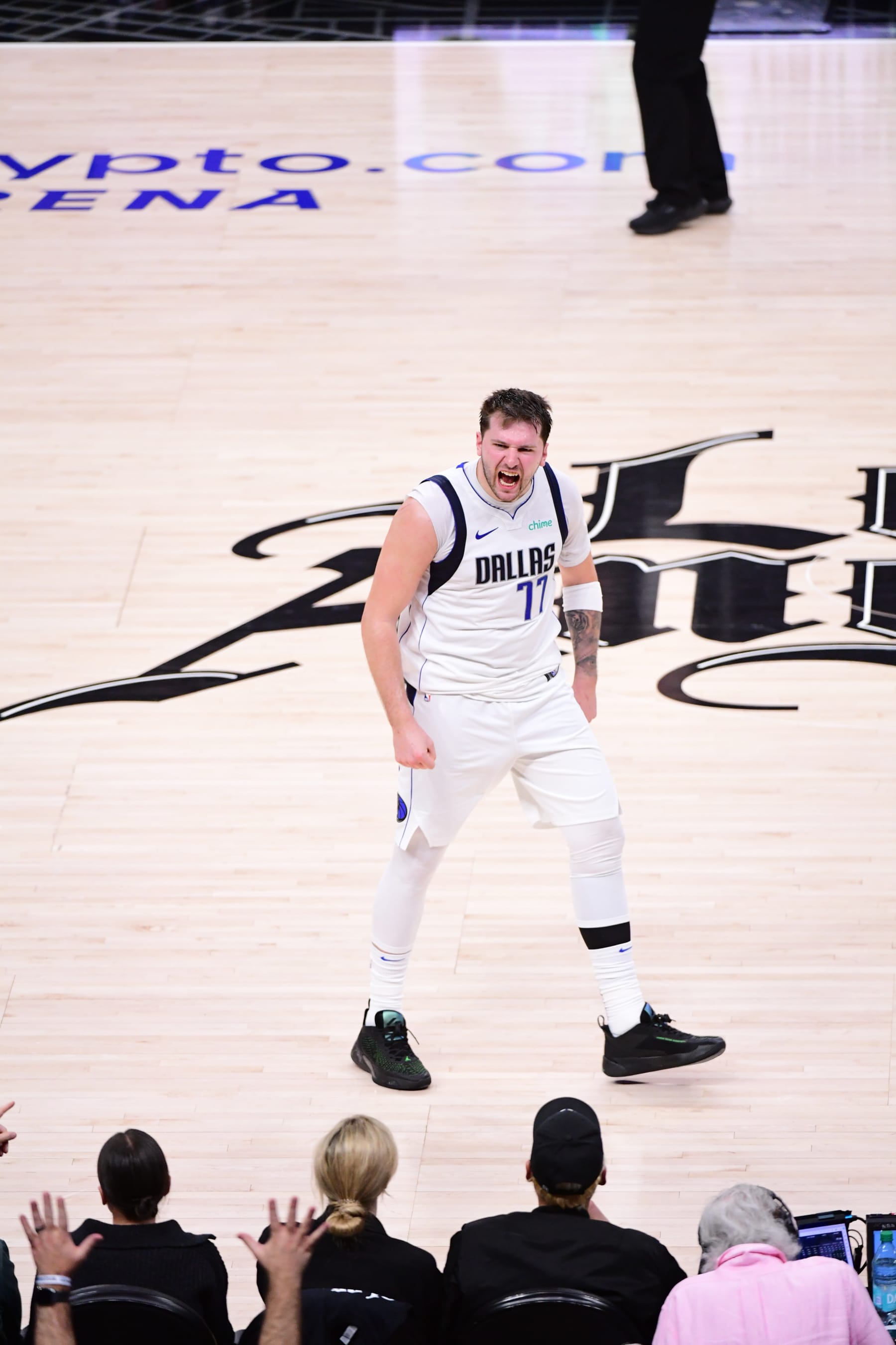 LOS ANGELES, CA - APRIL 23: Luka Doncic #77 of the Dallas Mavericks celebrate during the game against the LA Clippers during Round 1 Game 2 of the 2024 NBA Playoffs on April 23, 2024 at Crypto.Com Arena in Los Angeles, California. NOTE TO USER: User expressly acknowledges and agrees that, by downloading and/or using this Photograph, user is consenting to the terms and conditions of the Getty Images License Agreement. Mandatory Copyright Notice: Copyright 2024 NBAE (Photo by Adam Pantozzi/NBAE via Getty Images)
